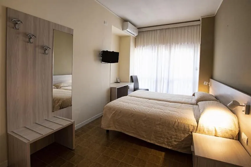 Bed in Hotel Scacciapensieri