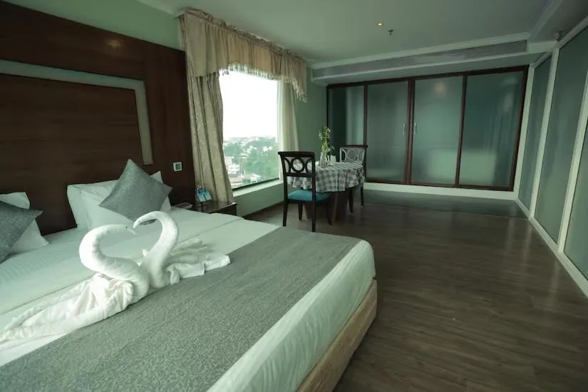 Bed in The Quilon Beach Hotel and Convention Center