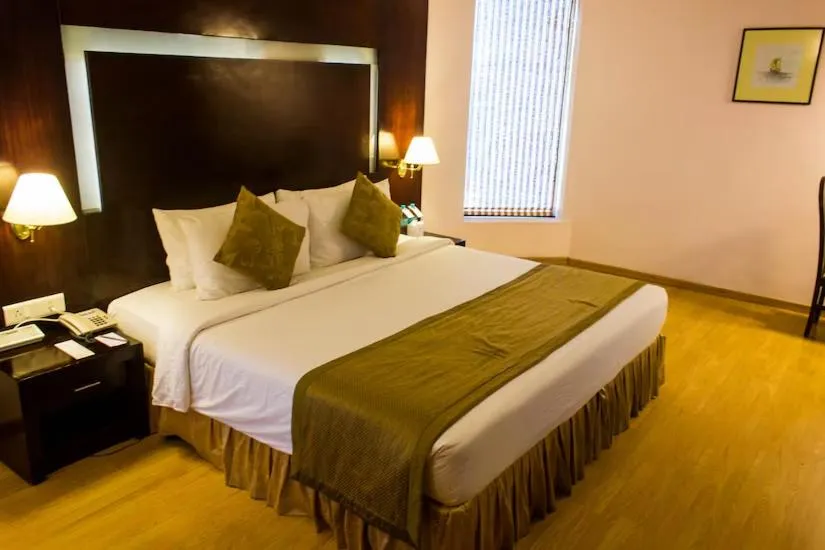 Bed in The Quilon Beach Hotel and Convention Center