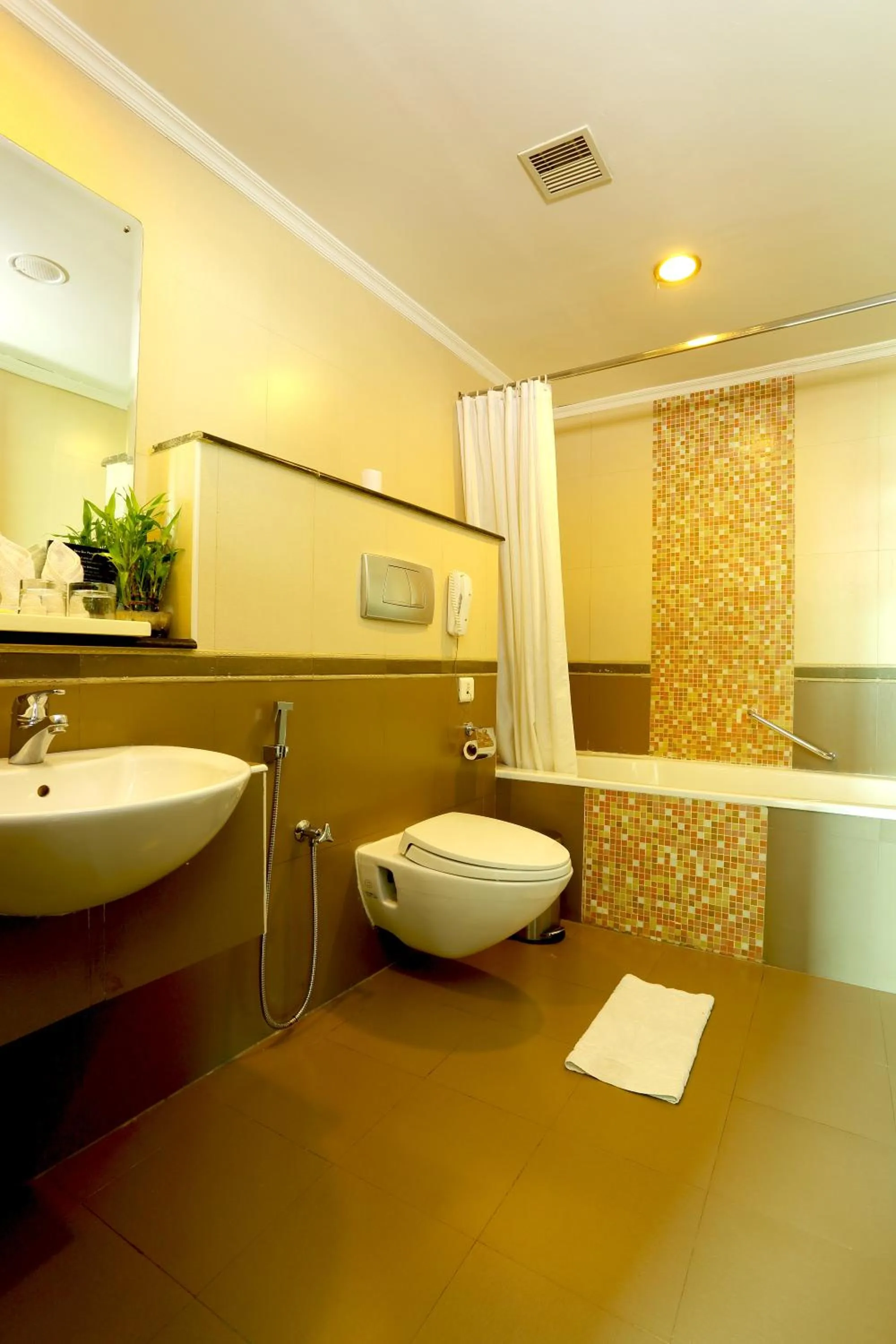 Bathroom in The Quilon Beach Hotel and Convention Center