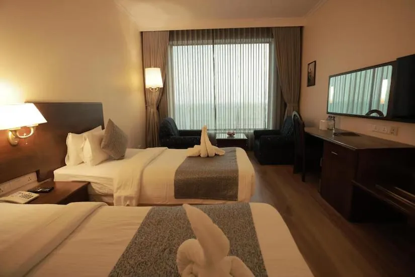 Bedroom, Bed in The Quilon Beach Hotel and Convention Center