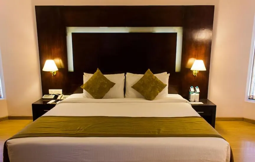 Bed in The Quilon Beach Hotel and Convention Center