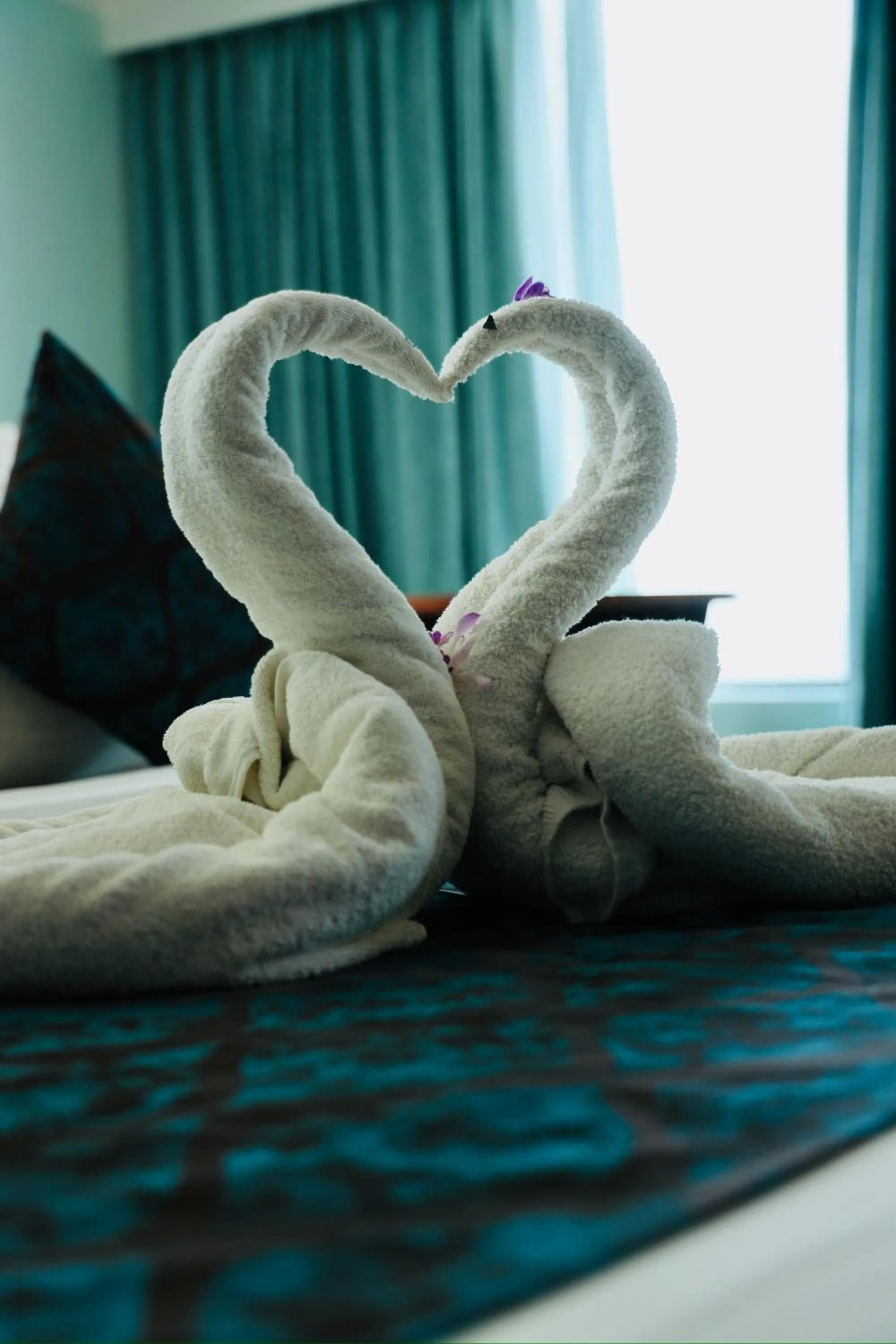 Bed in The Quilon Beach Hotel and Convention Center