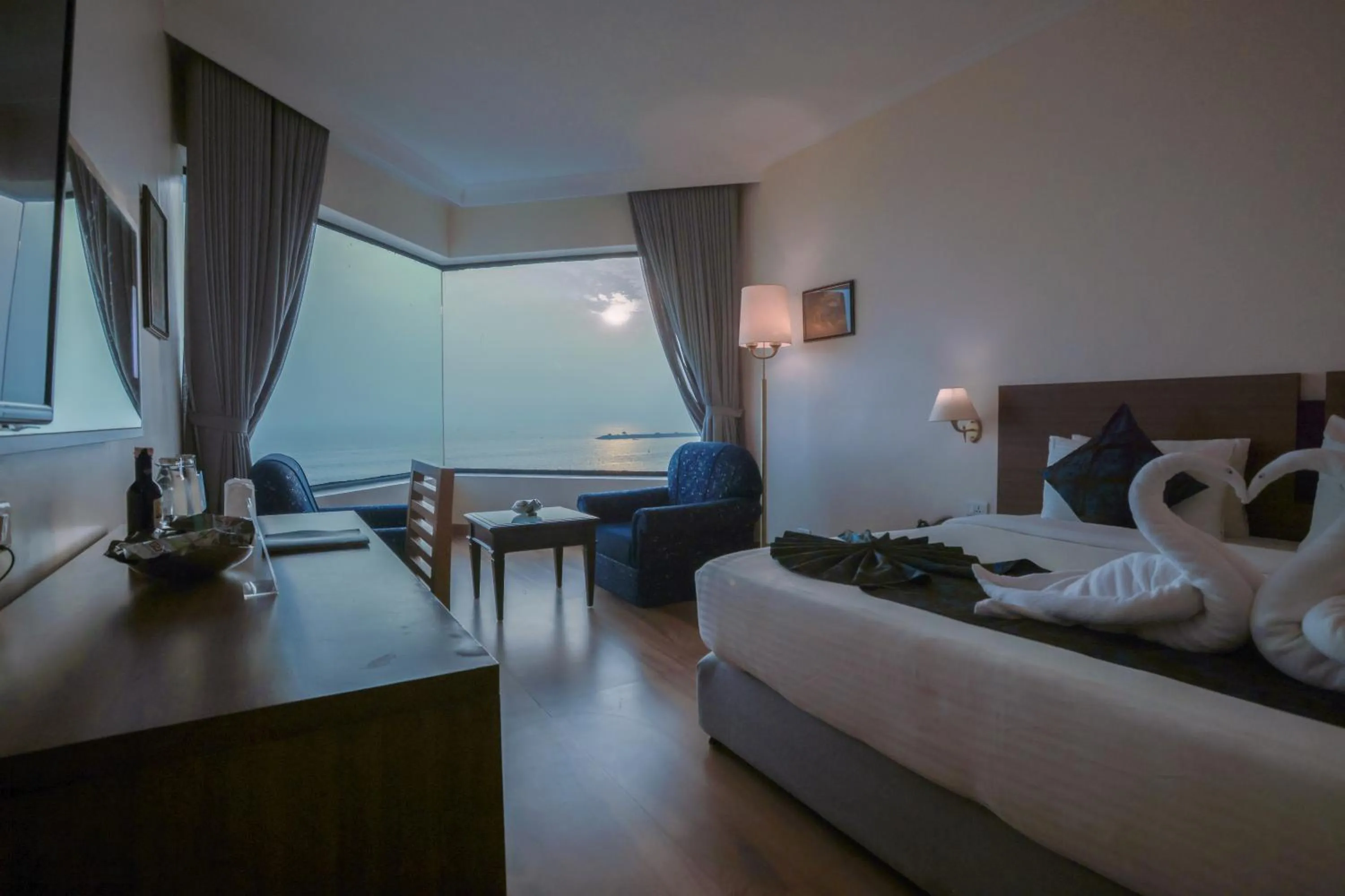 Bed in The Quilon Beach Hotel and Convention Center