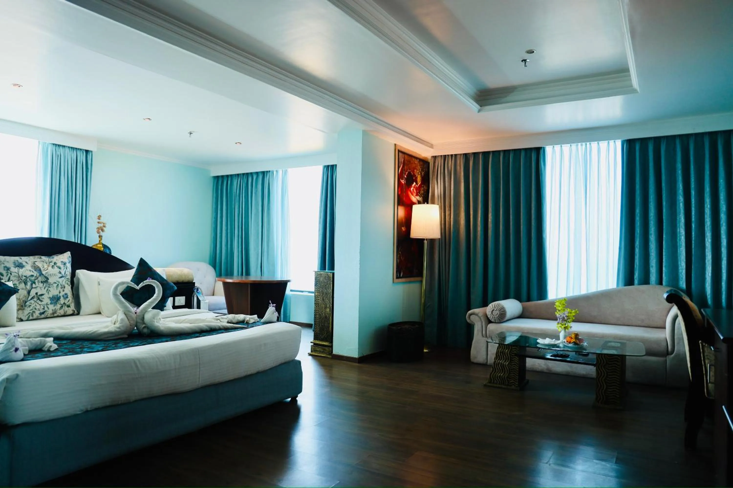 Bed in The Quilon Beach Hotel and Convention Center