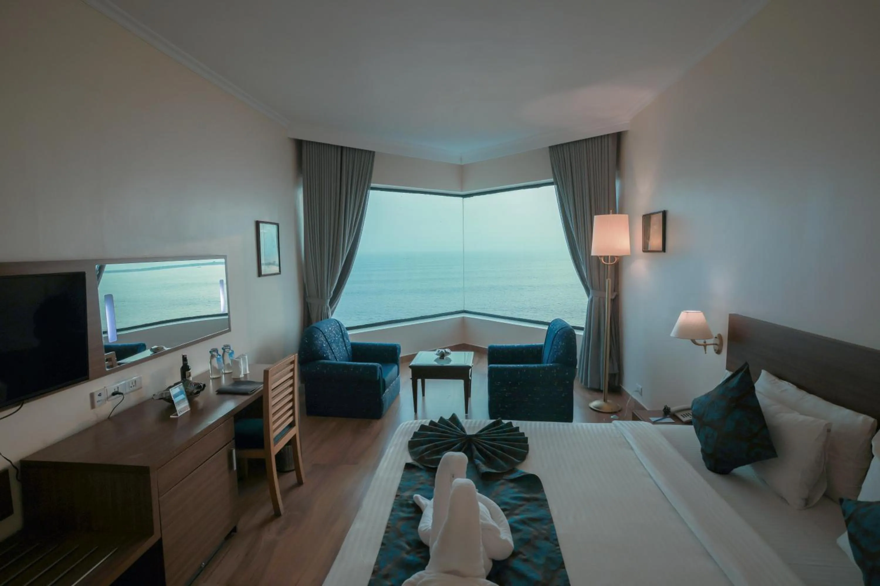 Bed in The Quilon Beach Hotel and Convention Center