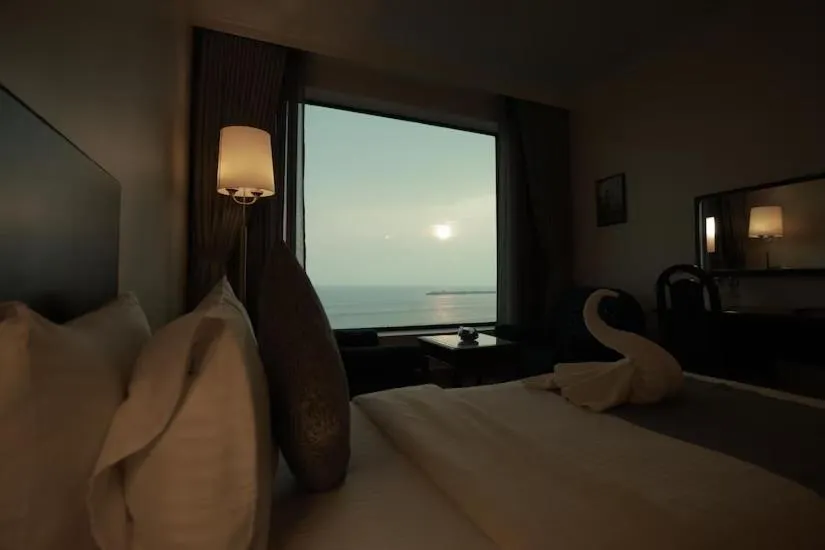 Natural landscape, Bed in The Quilon Beach Hotel and Convention Center