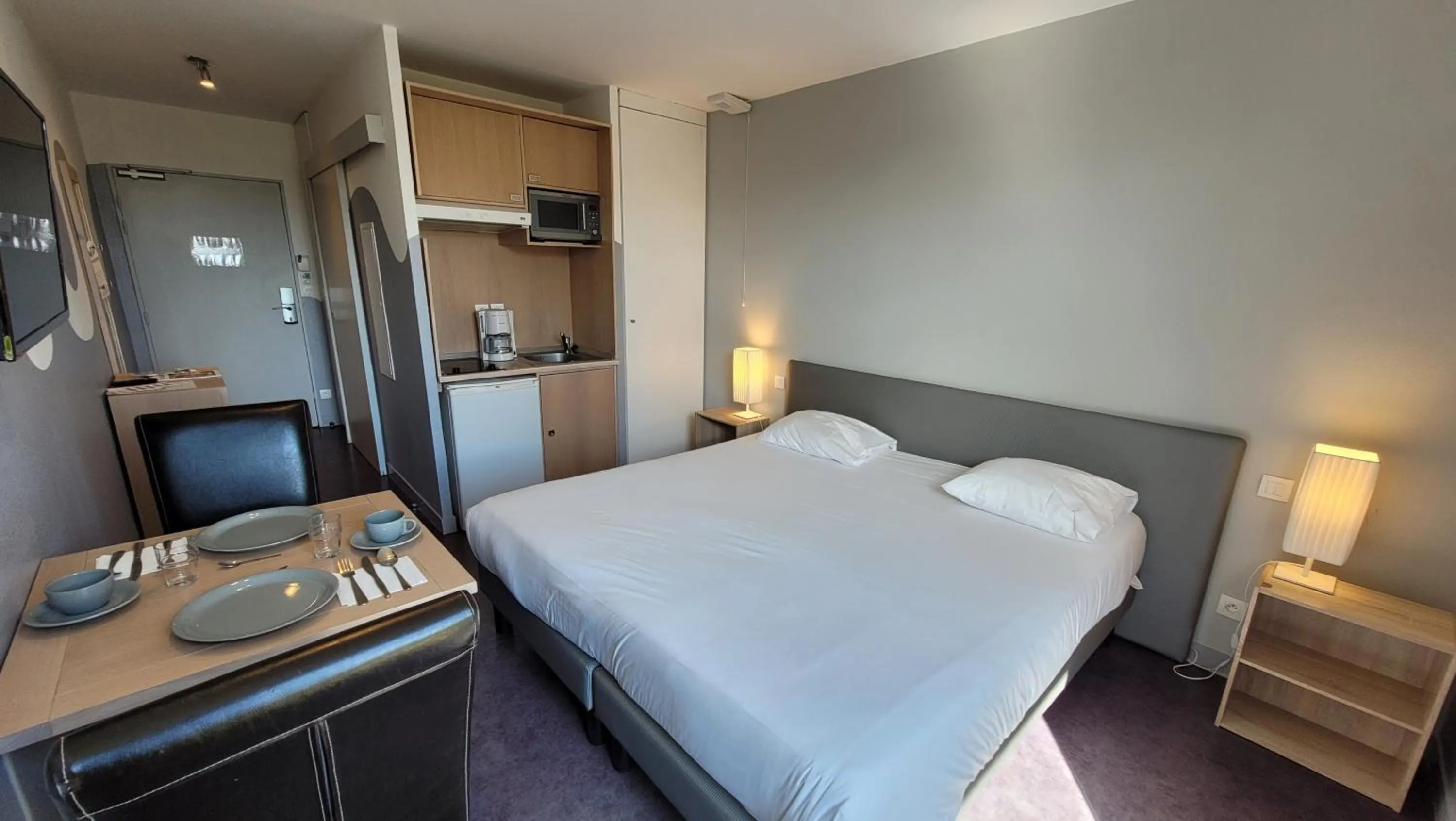 Bed in Gold Beach Hotel & RESIDENCE