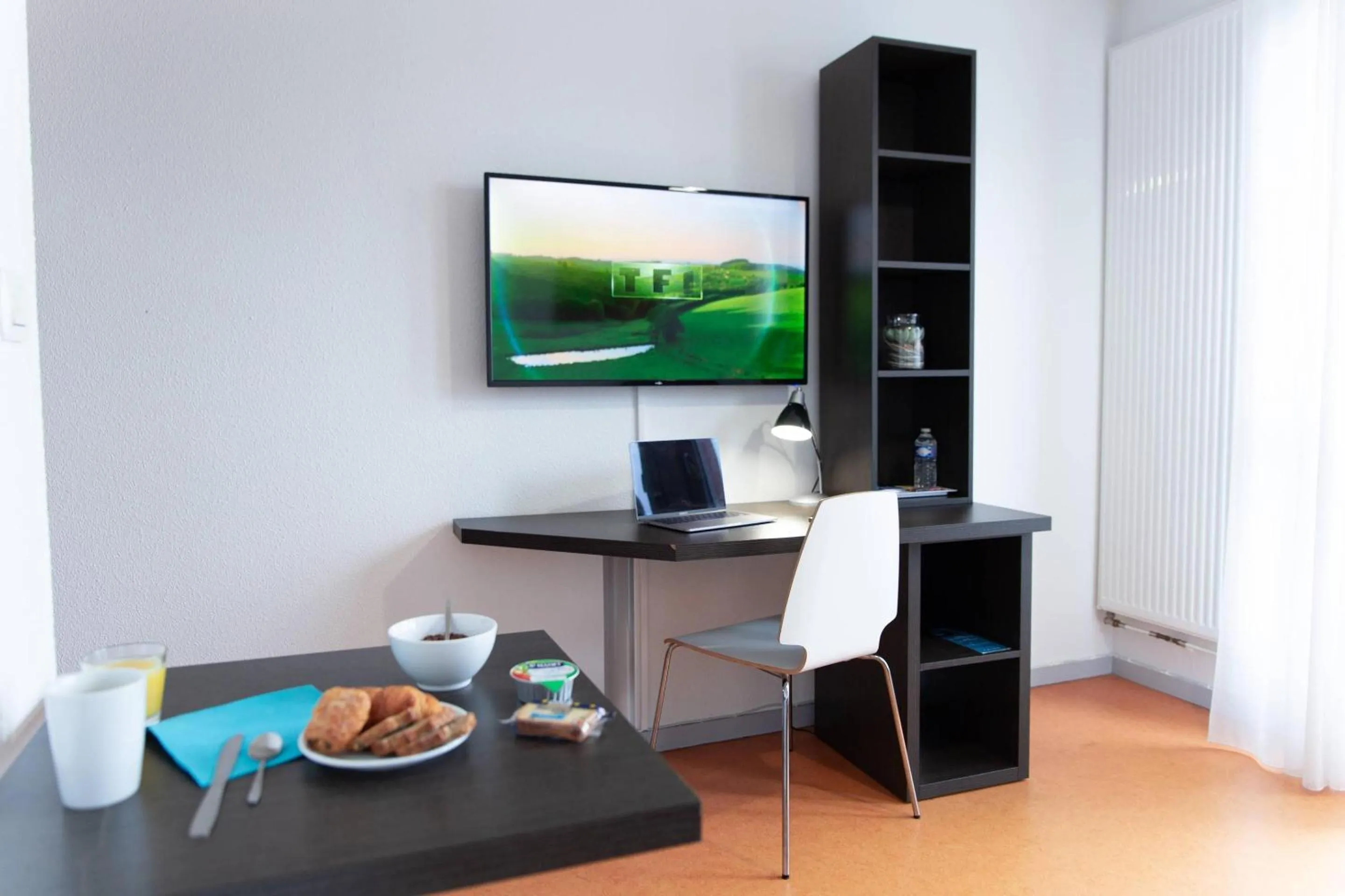 Living room in Comfort Aparthotel Besancon Hauts du Chazal