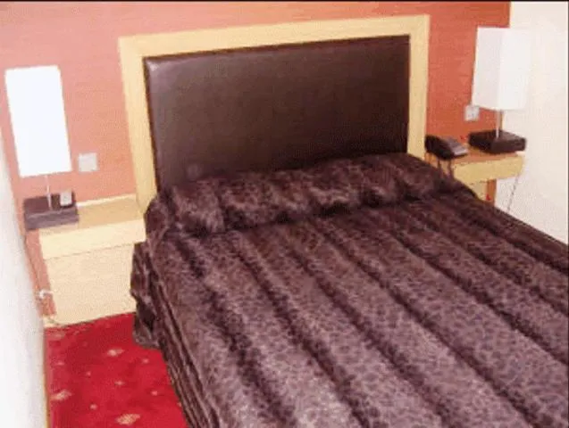 Bed in Aegli Hotel