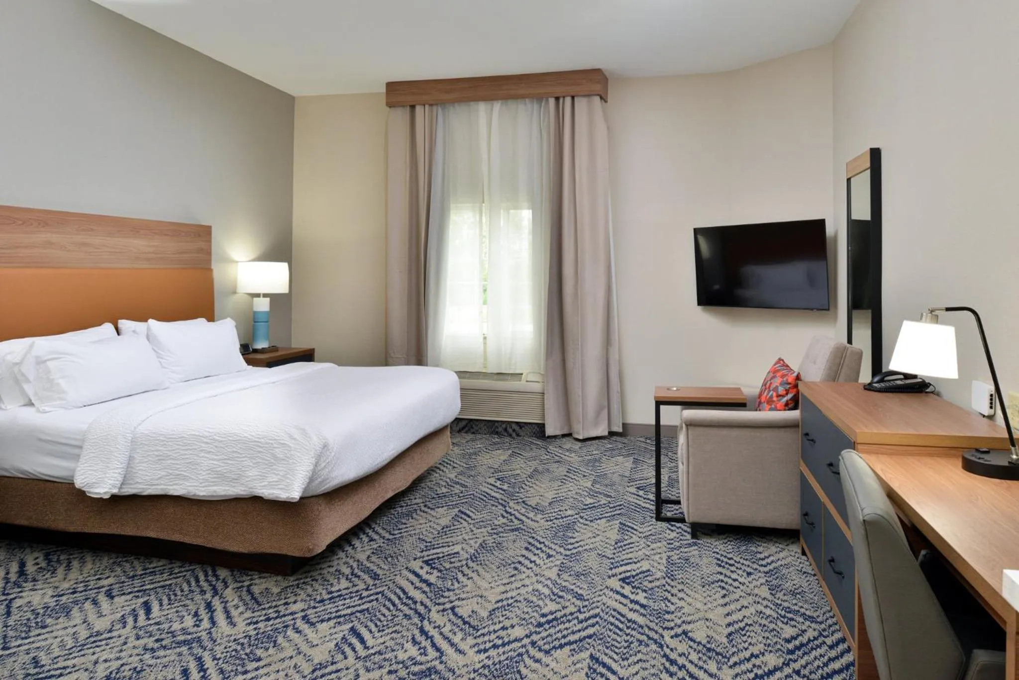 Photo of the whole room, Bed in Candlewood Suites Kansas City Northeast by IHG