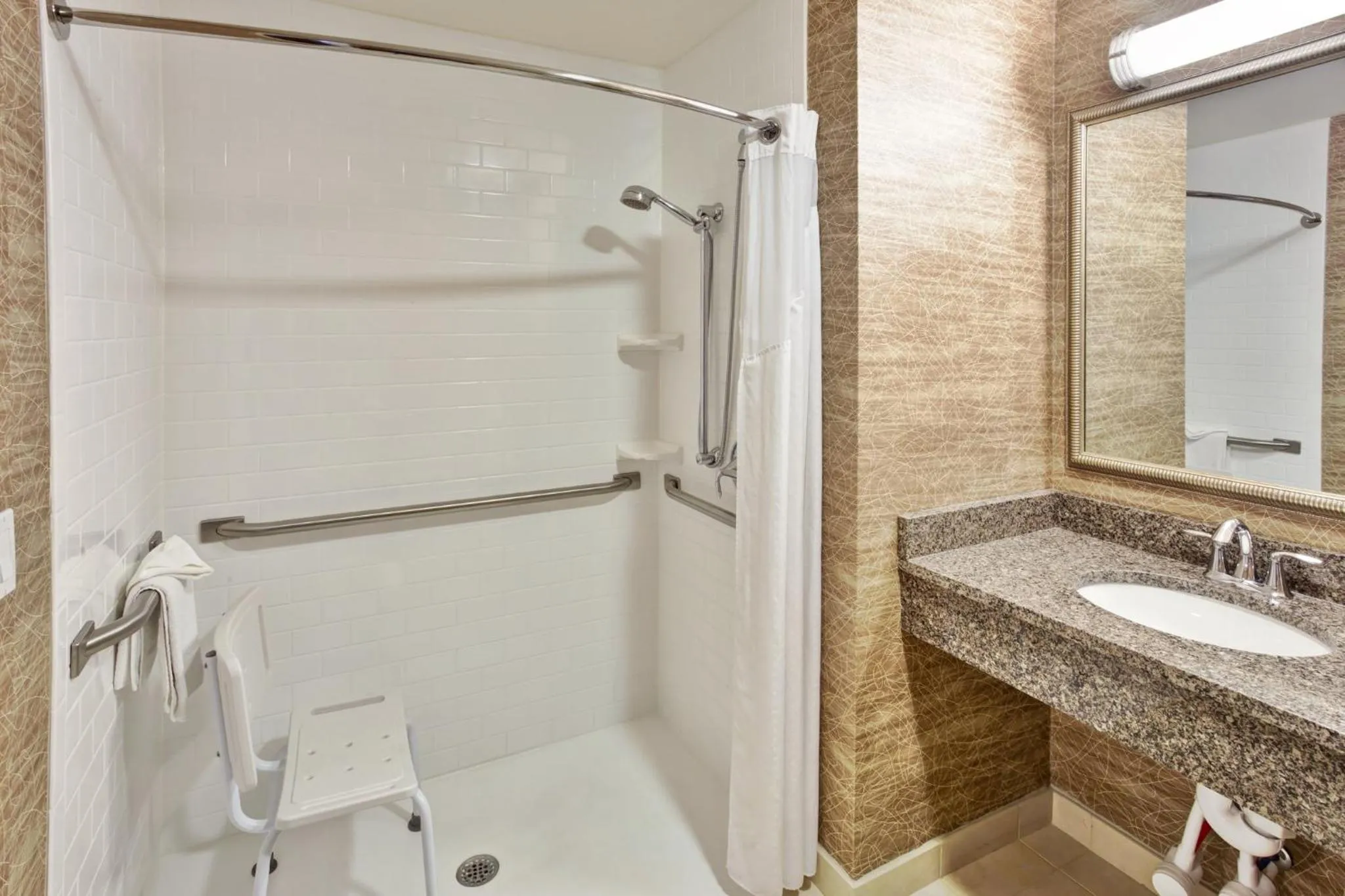 Bathroom in Holiday Inn Detroit Metro Airport by IHG