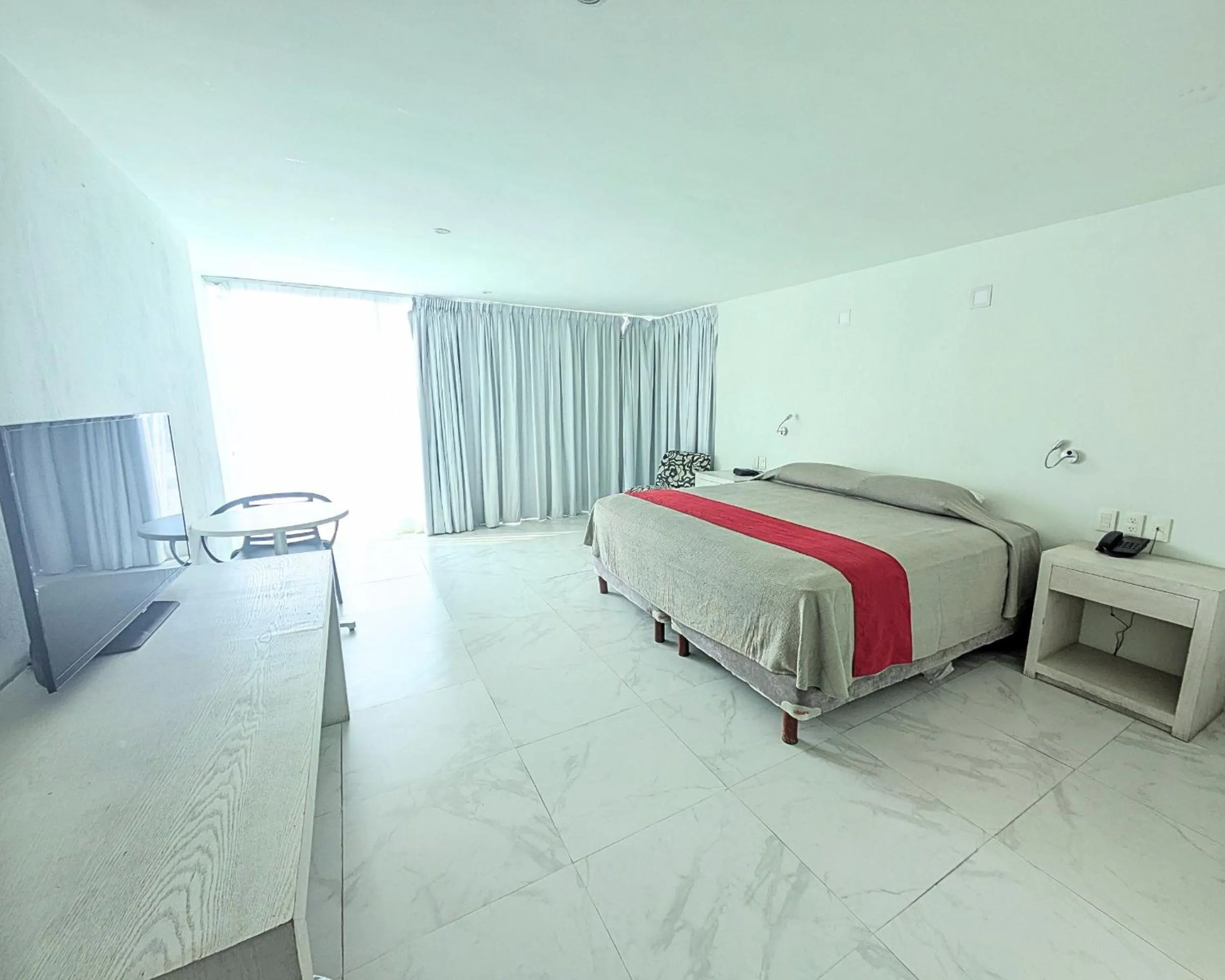 Bed in We Hotel Acapulco