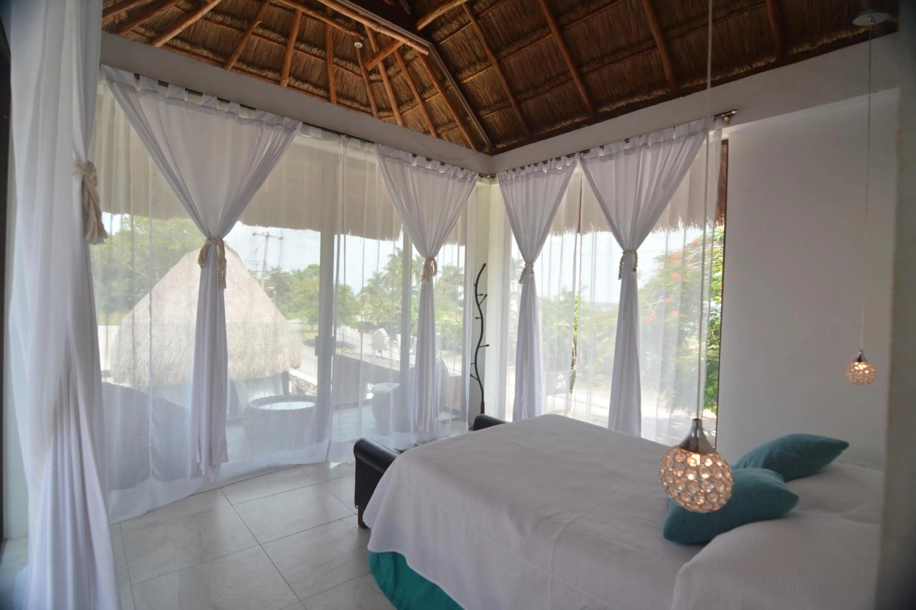 Bedroom, Bed in Cabañas Luxury con Lagoon Club - Adults Only