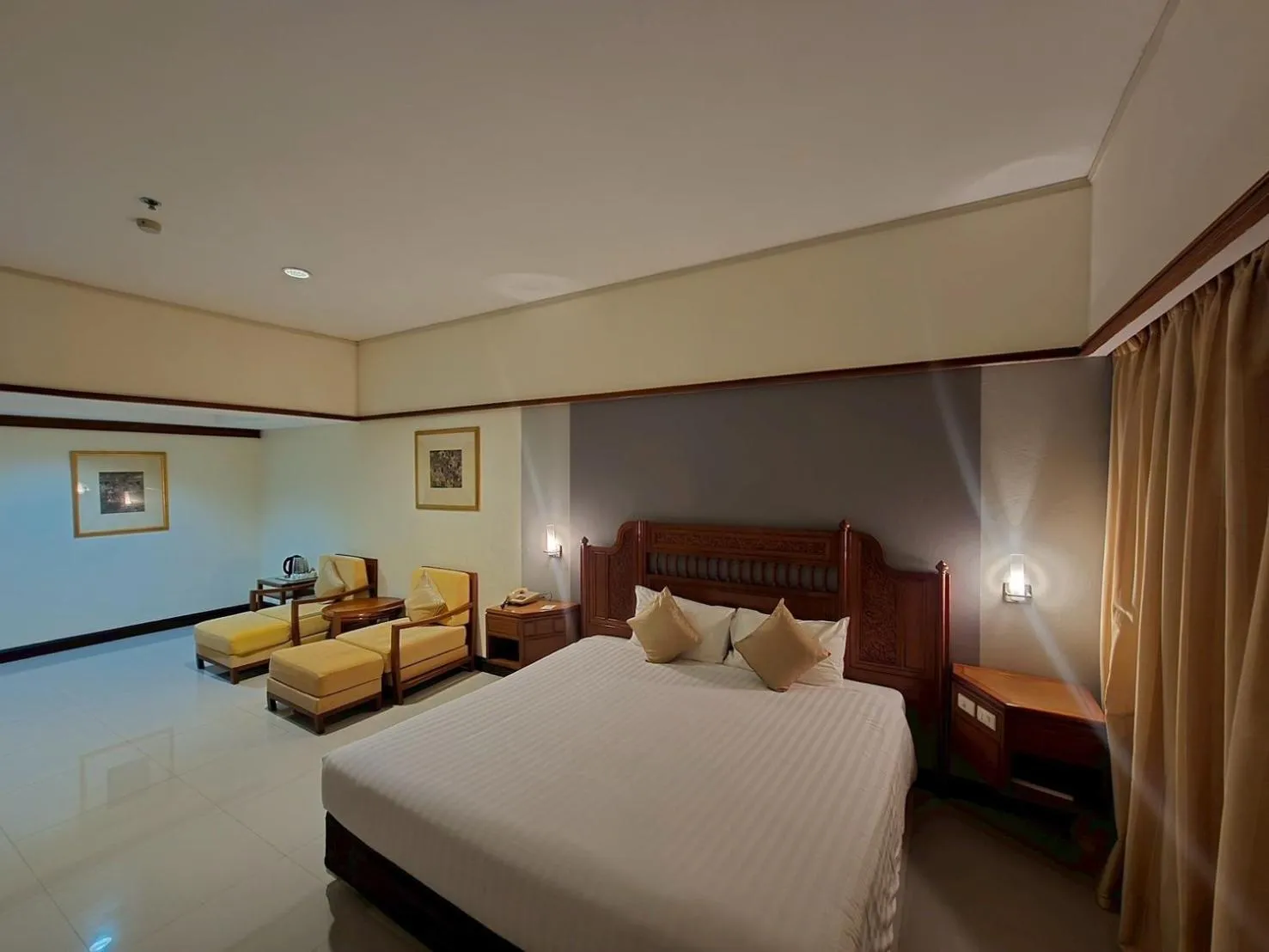 Bed in Loei Palace Hotel