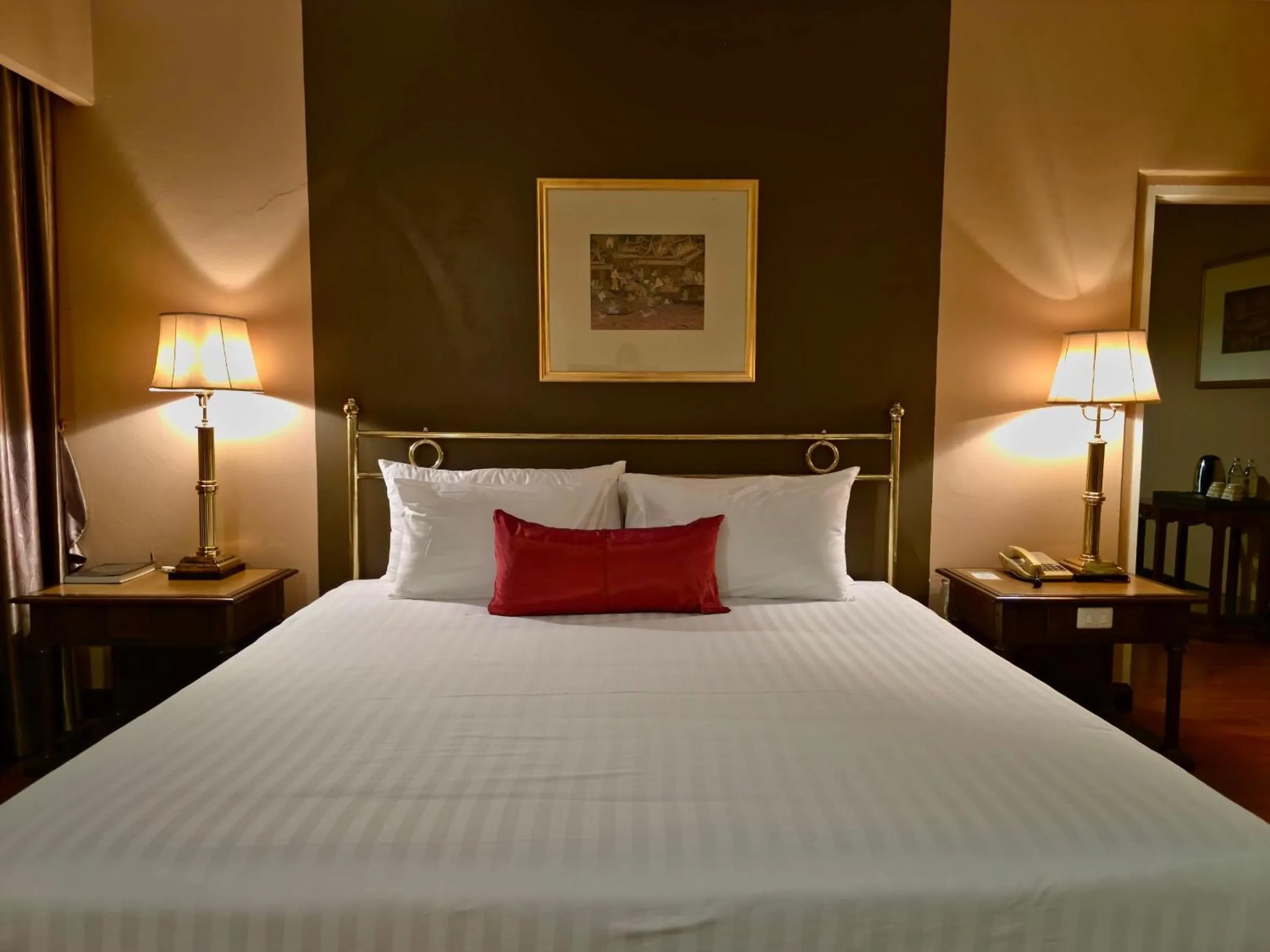 Bed in Loei Palace Hotel