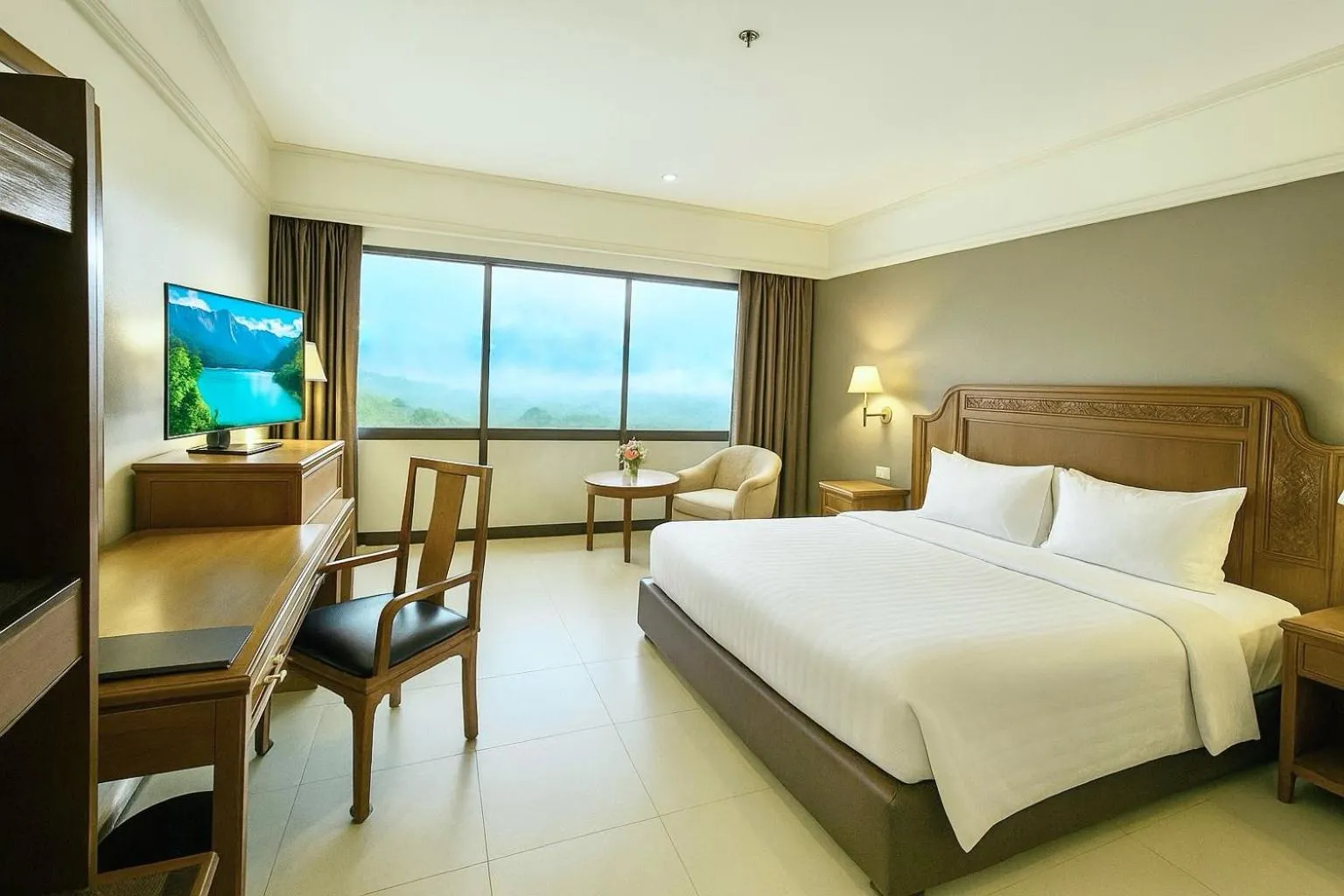 Bed in Loei Palace Hotel