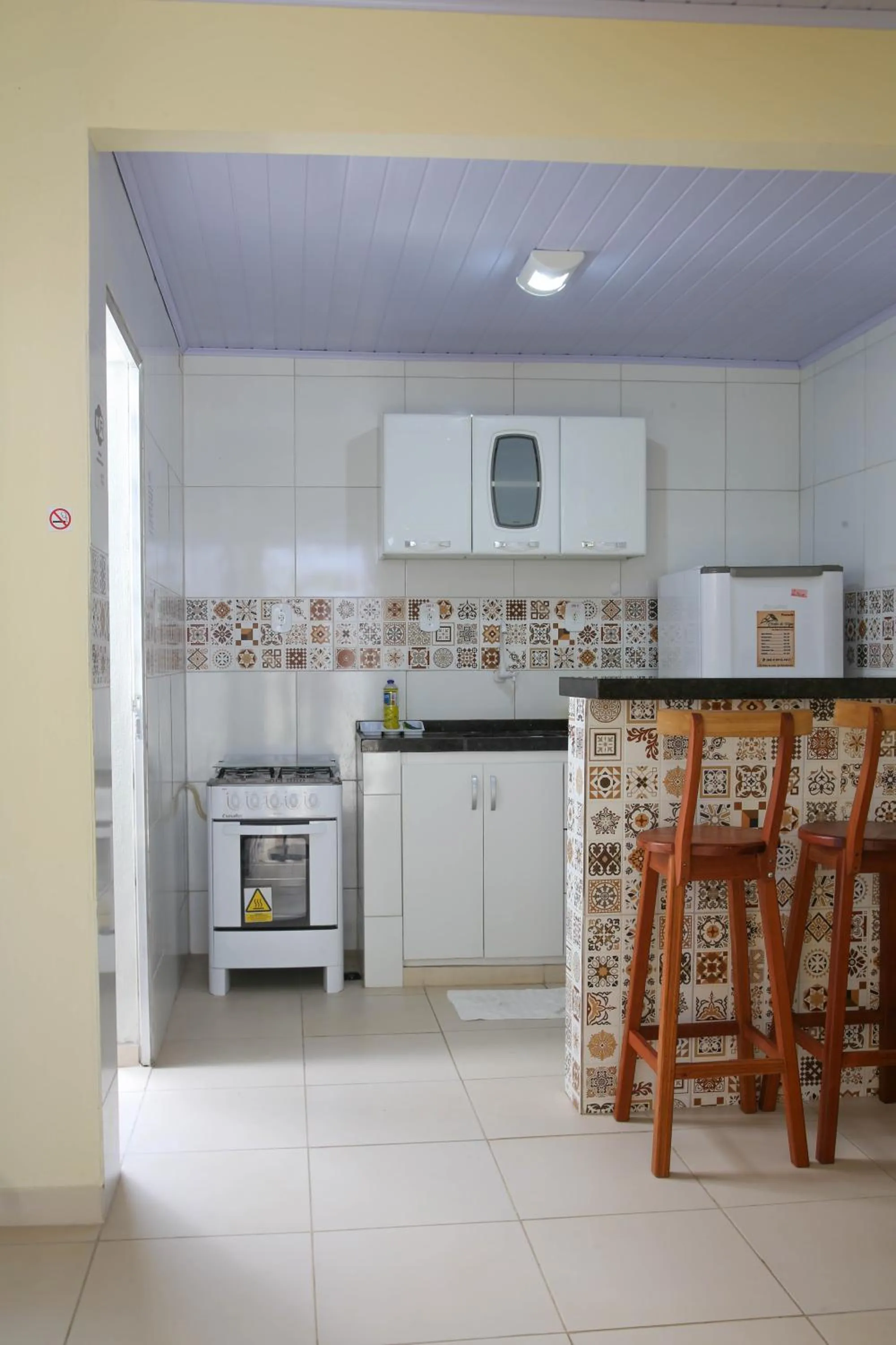 Kitchen or kitchenette in Pousada Chalés do Toque