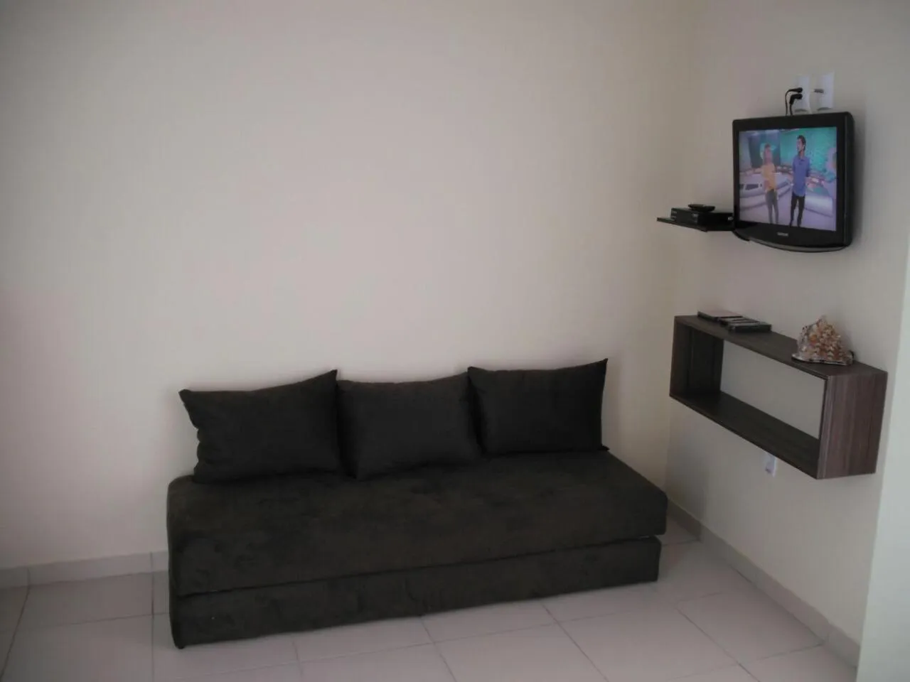 Communal lounge/ TV room in Pousada Chalés do Toque