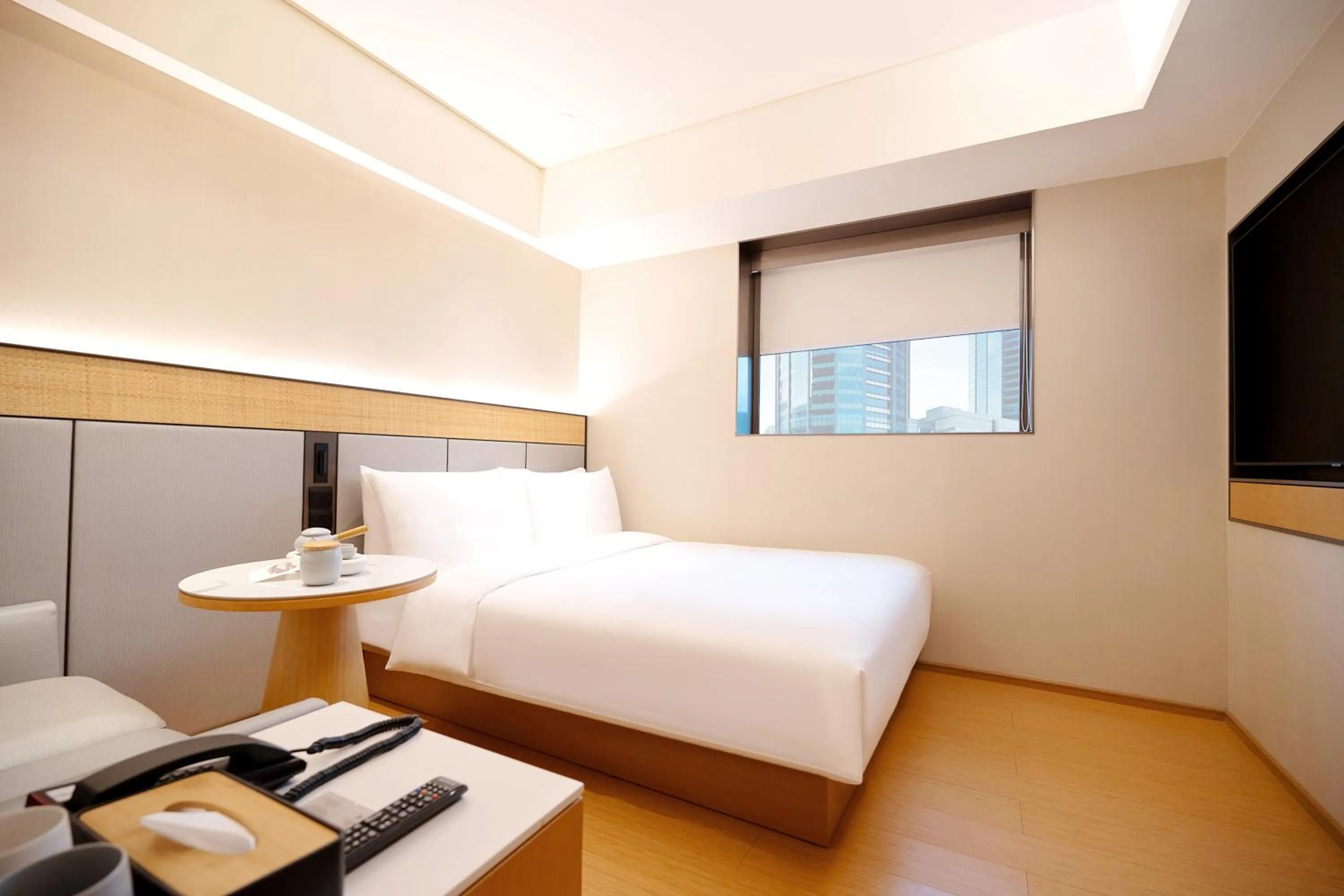 Bed in Ji Hotel Orchard Singapore