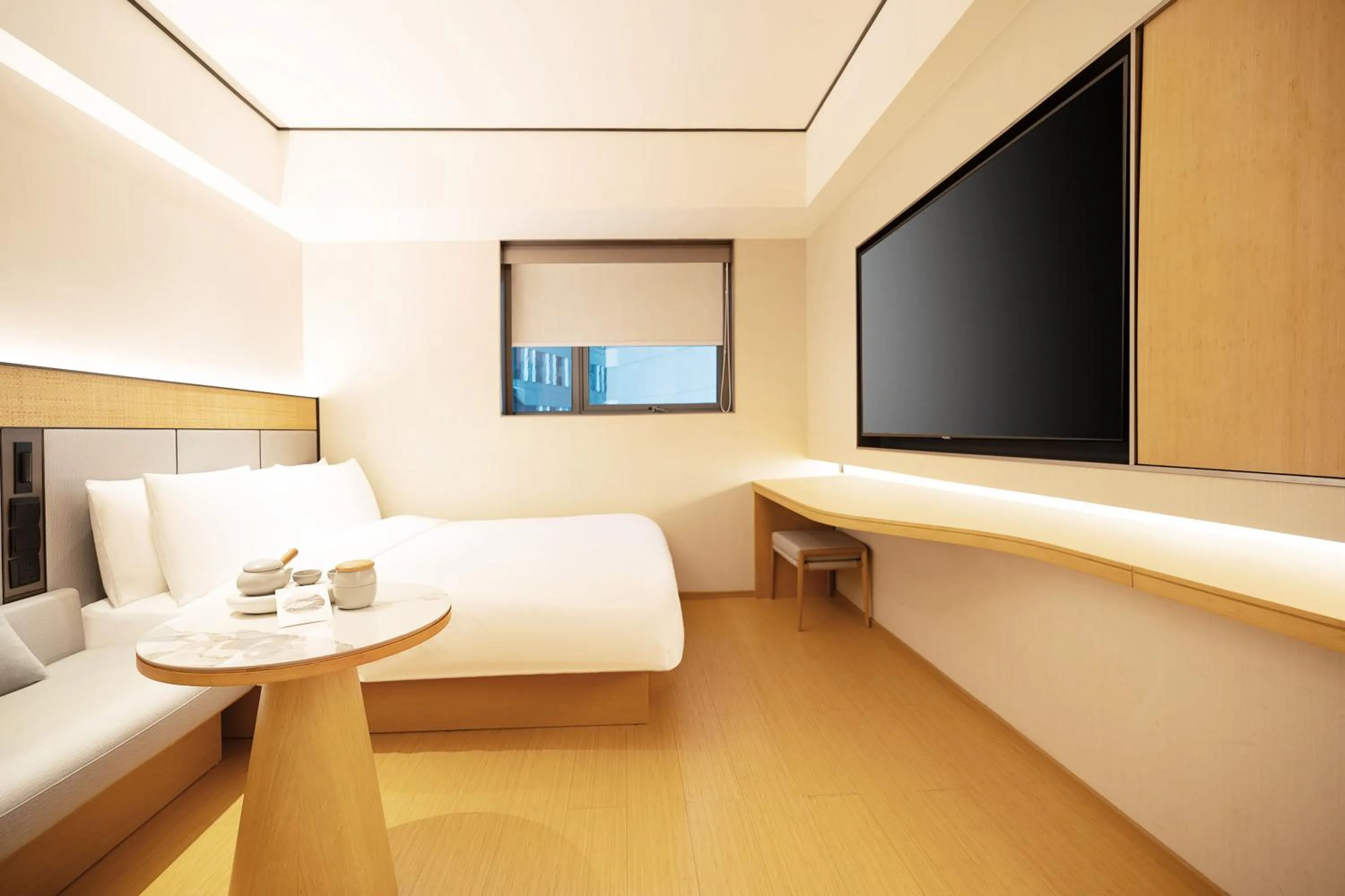 Bed in Ji Hotel Orchard Singapore