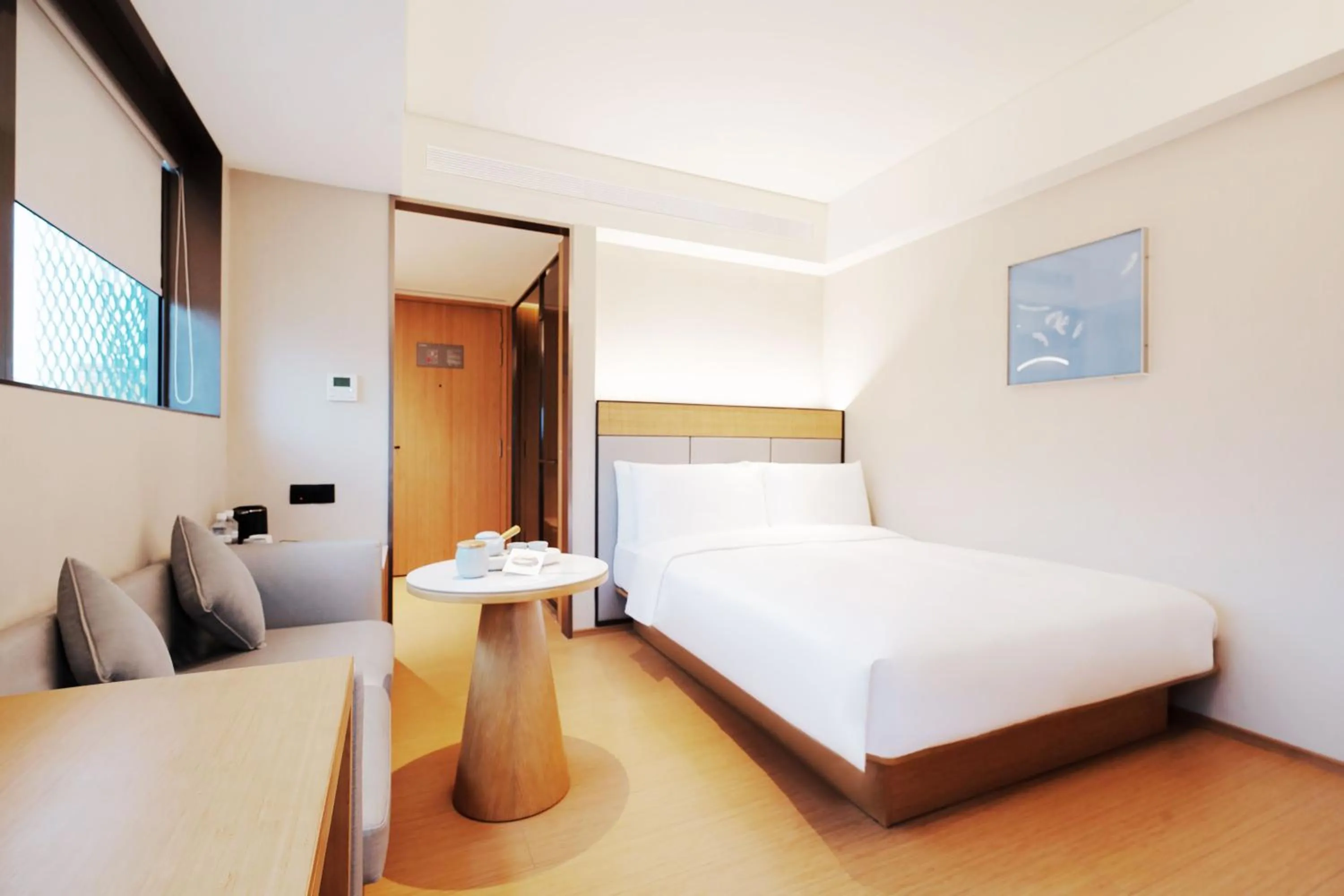 Bed in Ji Hotel Orchard Singapore