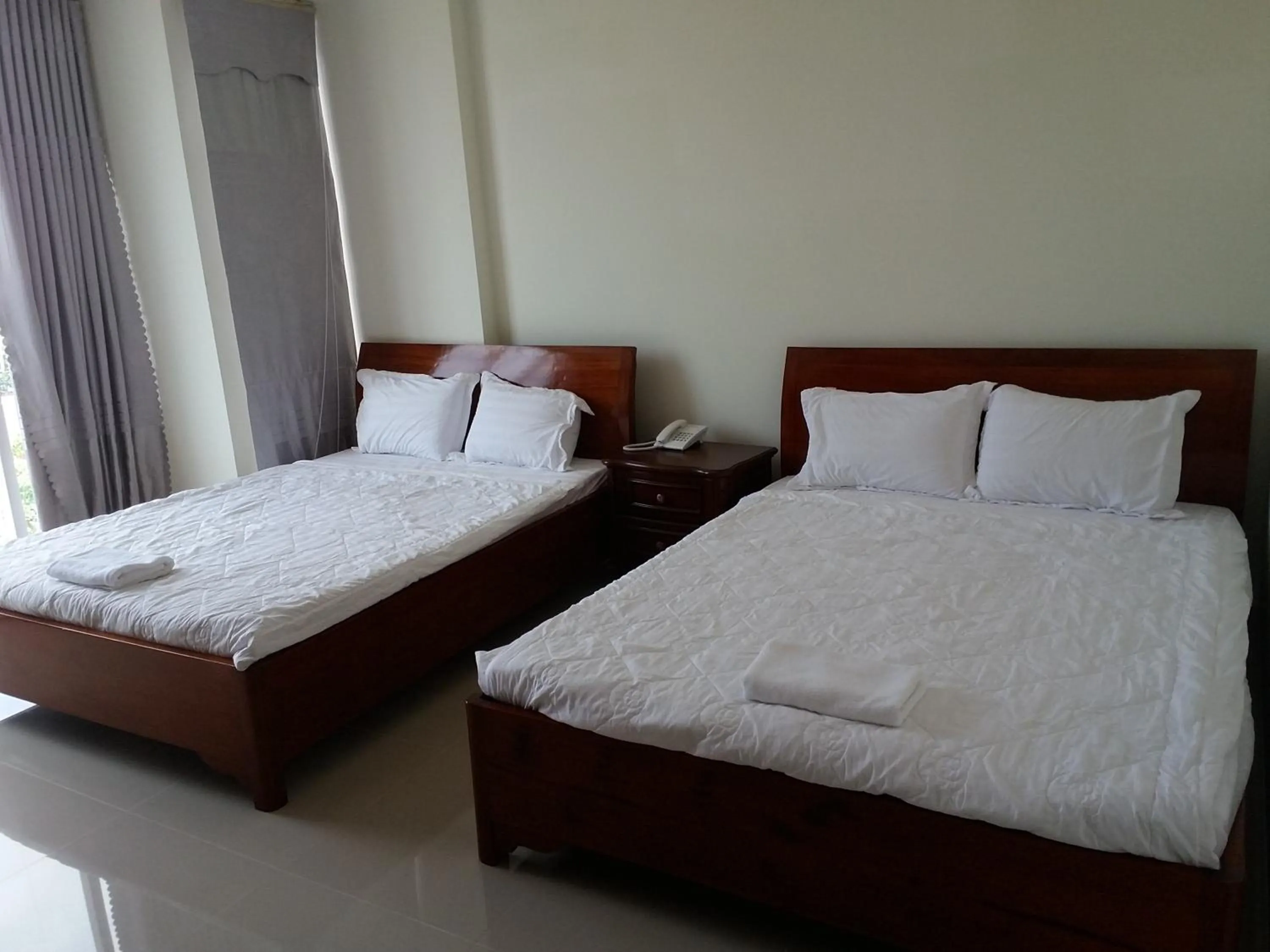 Bed in Motel Bao Linh