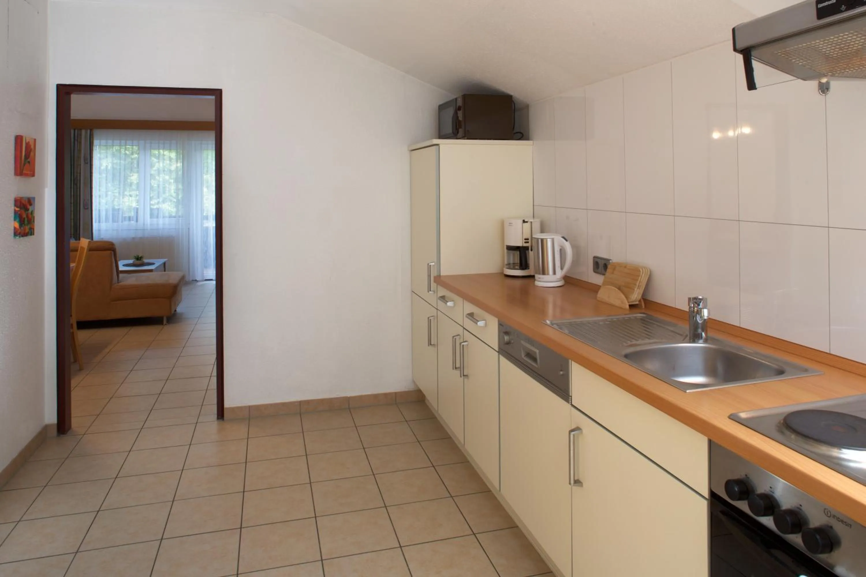 Kitchen or kitchenette in Appartement-Hotel Happy Kienberg