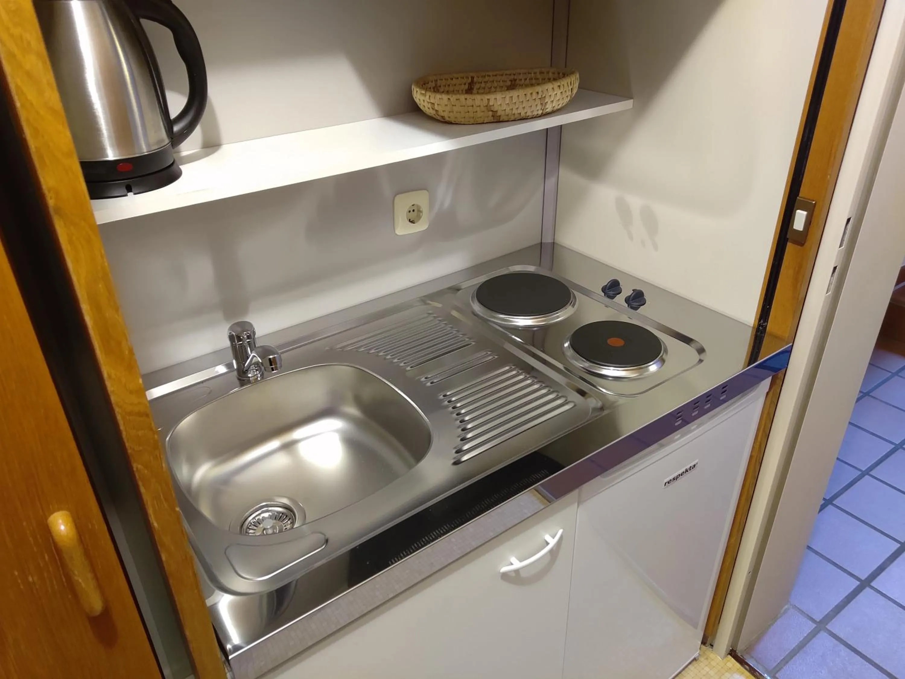 Kitchen or kitchenette in Appartement-Hotel Happy Kienberg