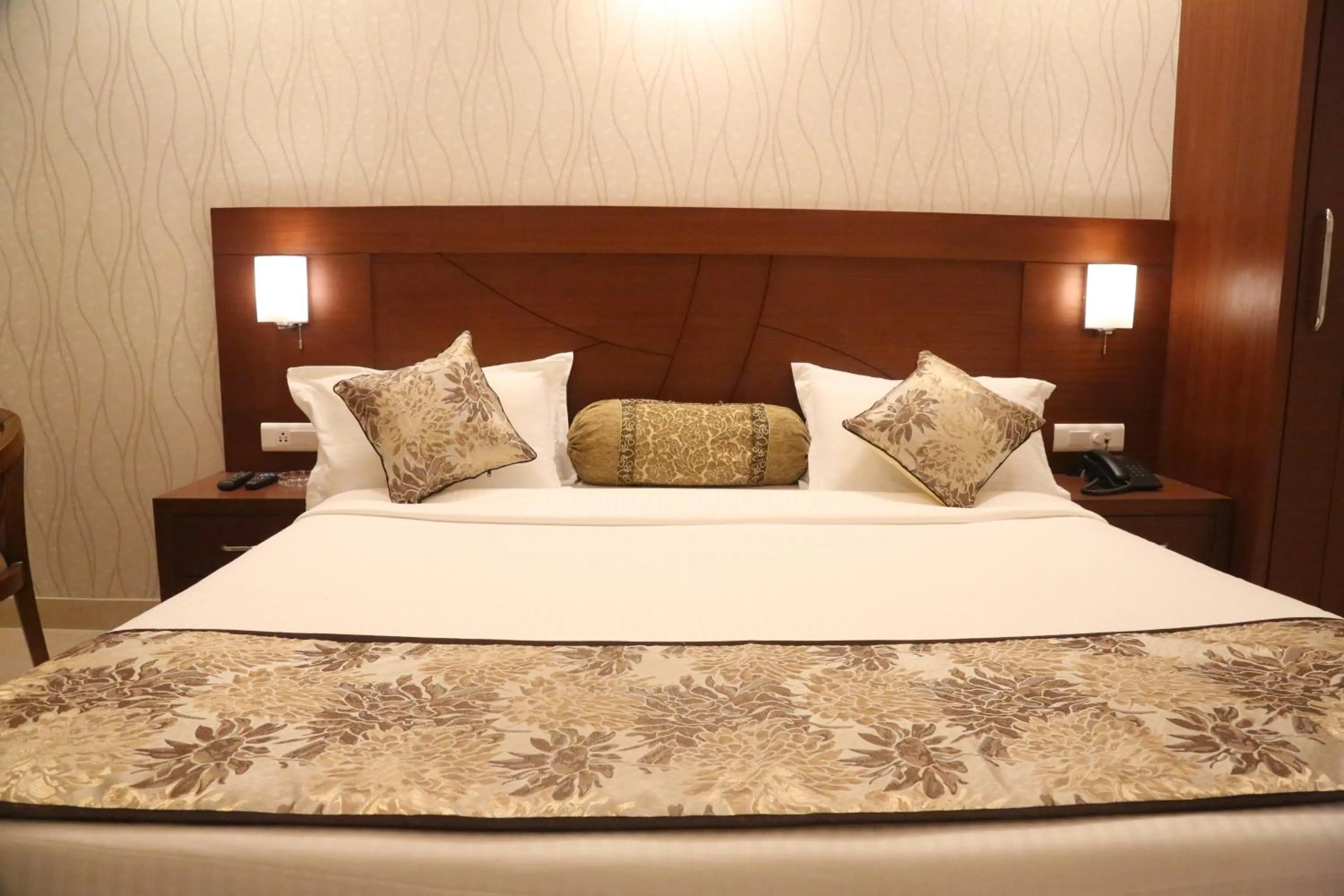 Photo of the whole room, Bed in Hotel Varanasi Inn