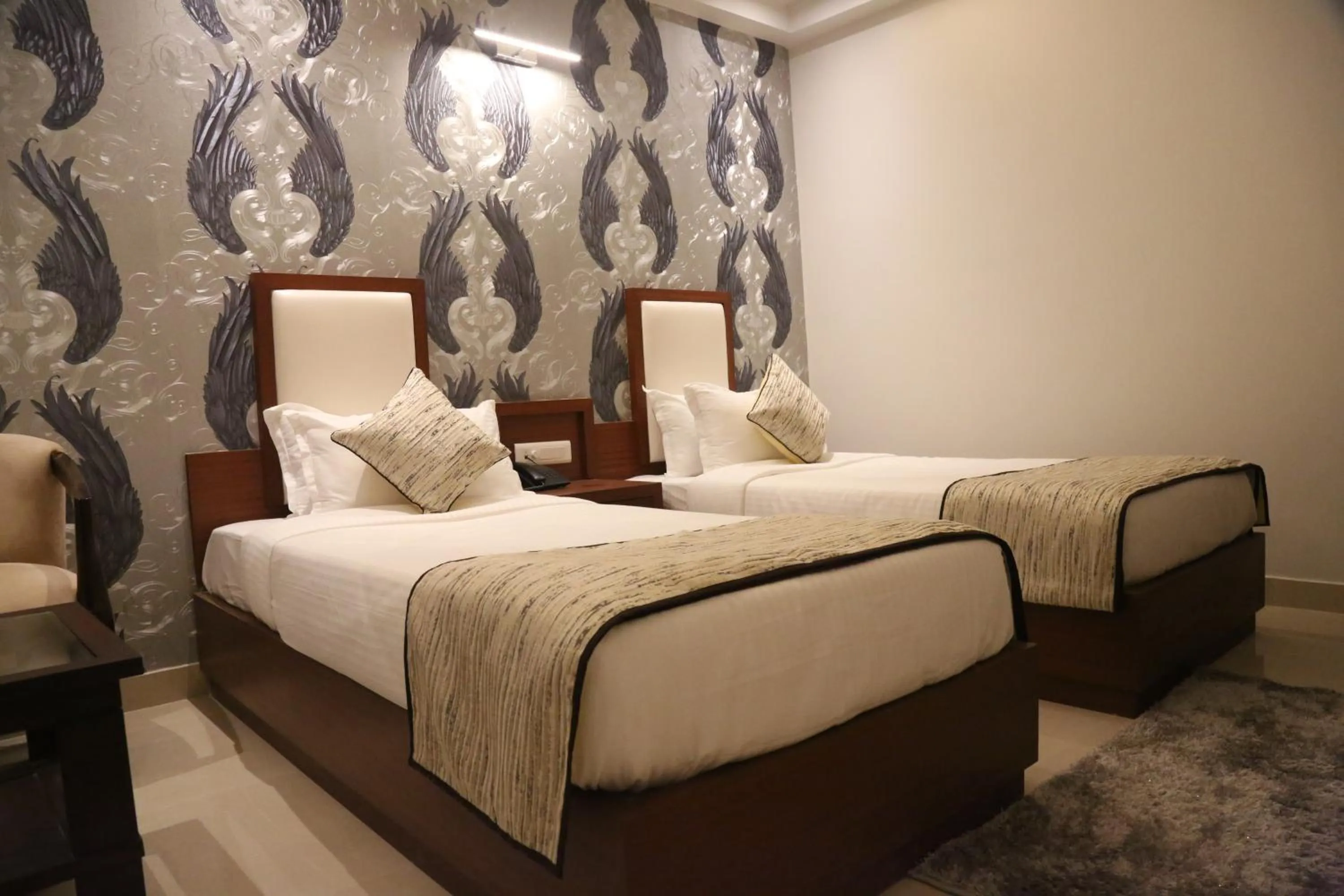 Bed in Hotel Varanasi Inn