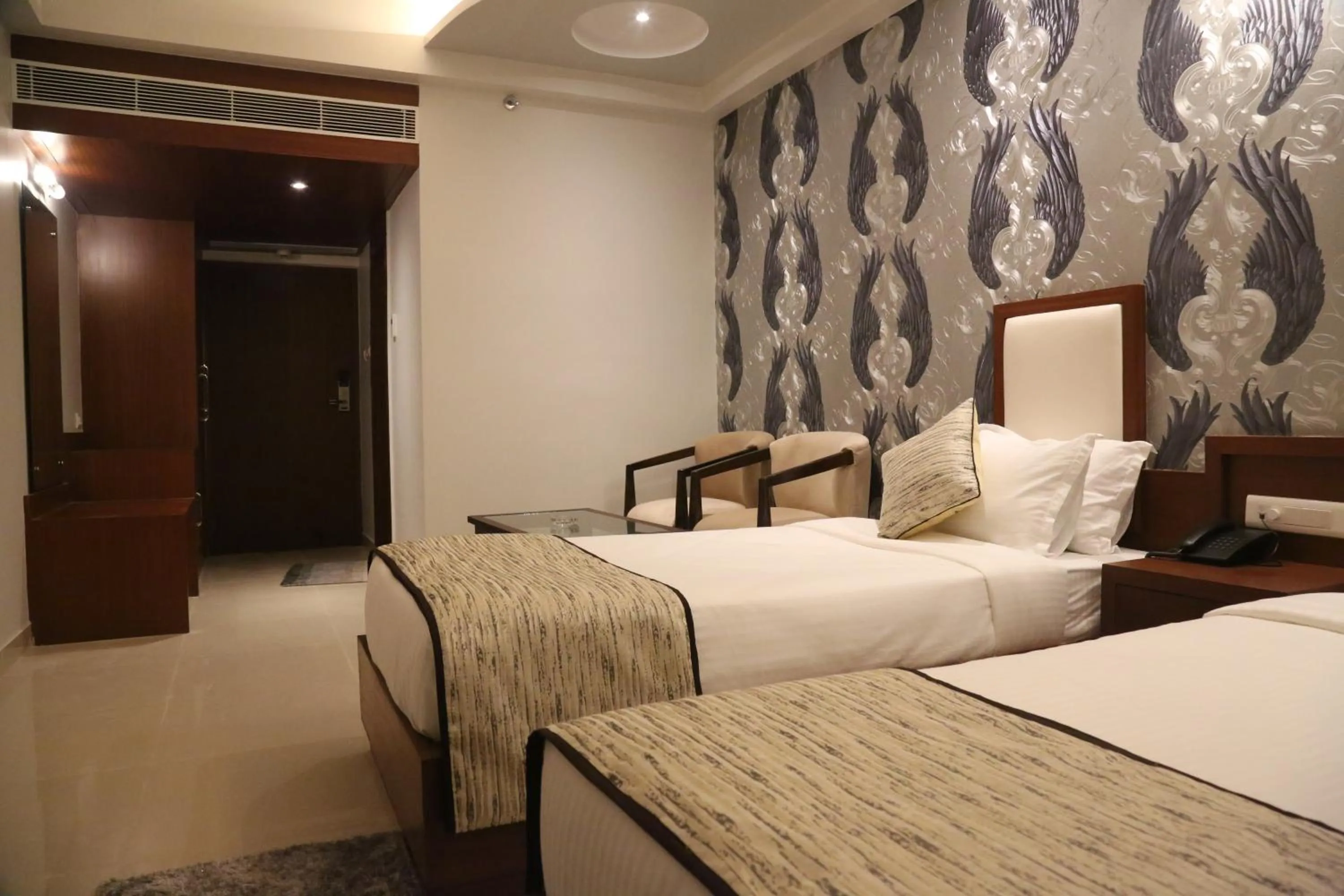 Bed in Hotel Varanasi Inn