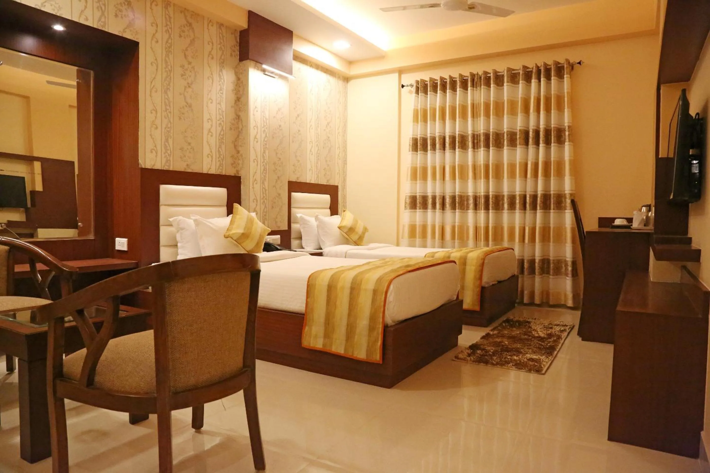 Bed in Hotel Varanasi Inn