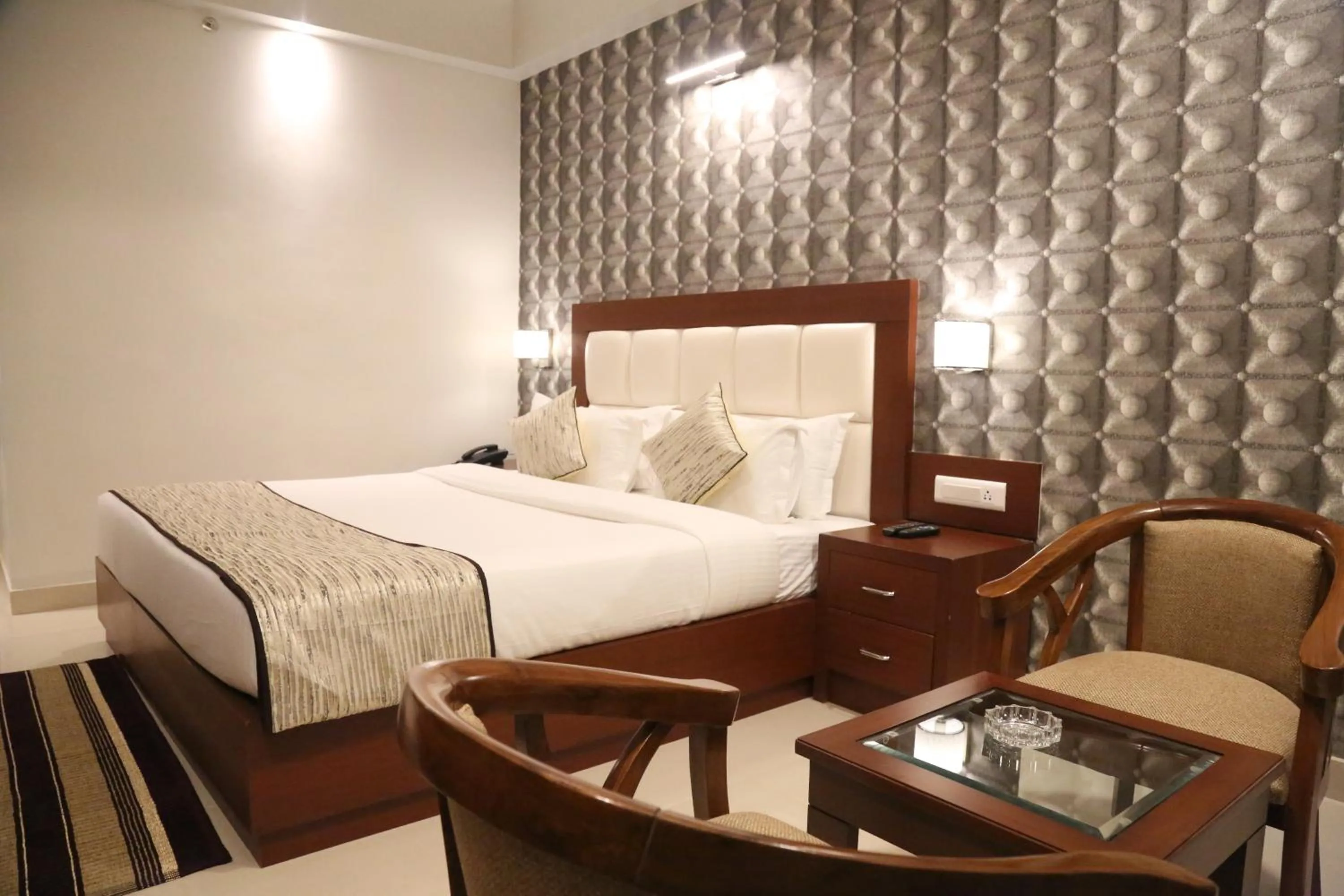 Photo of the whole room, Bed in Hotel Varanasi Inn