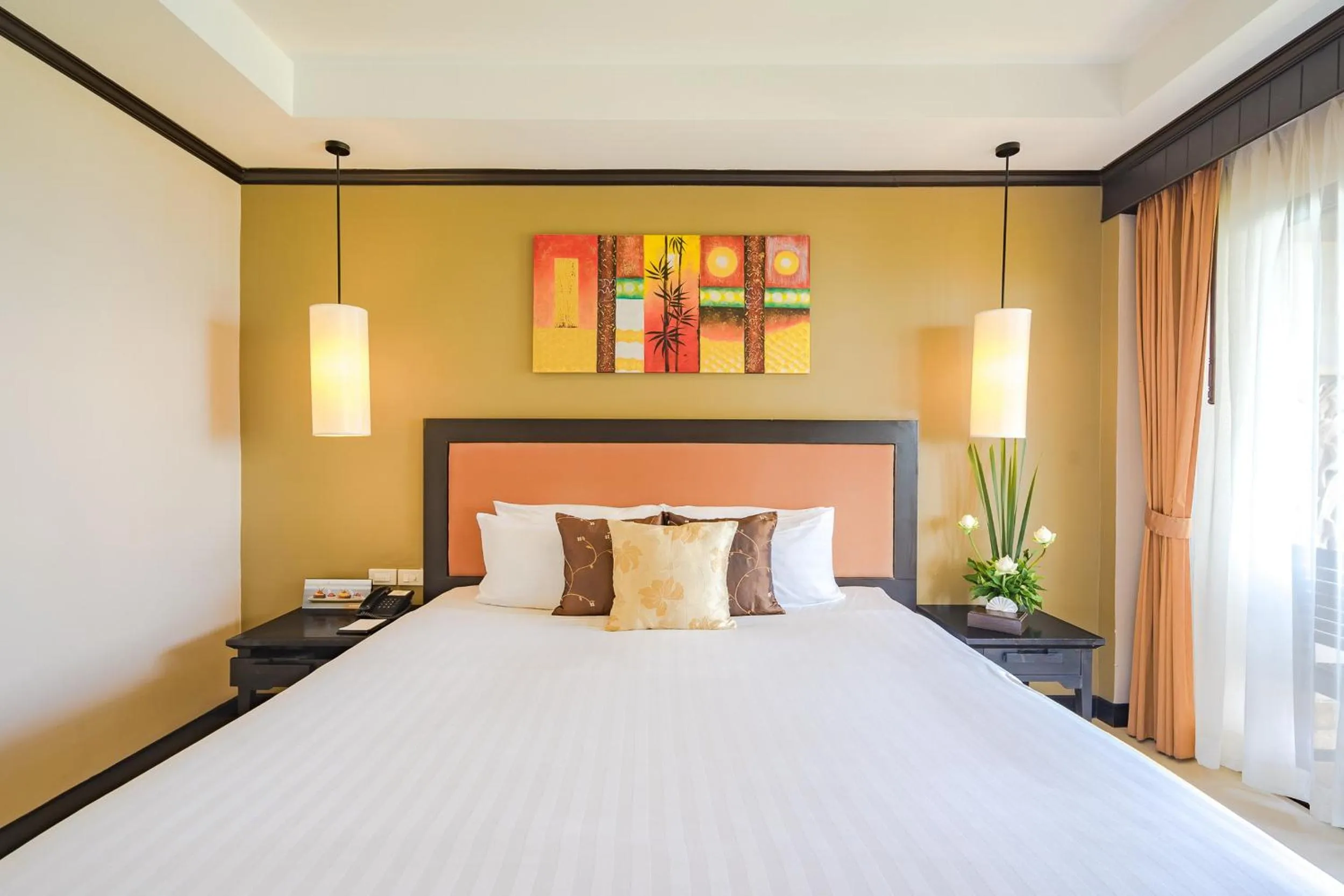 Bed in Impiana Beachfront Resort Chaweng Noi, Koh Samui