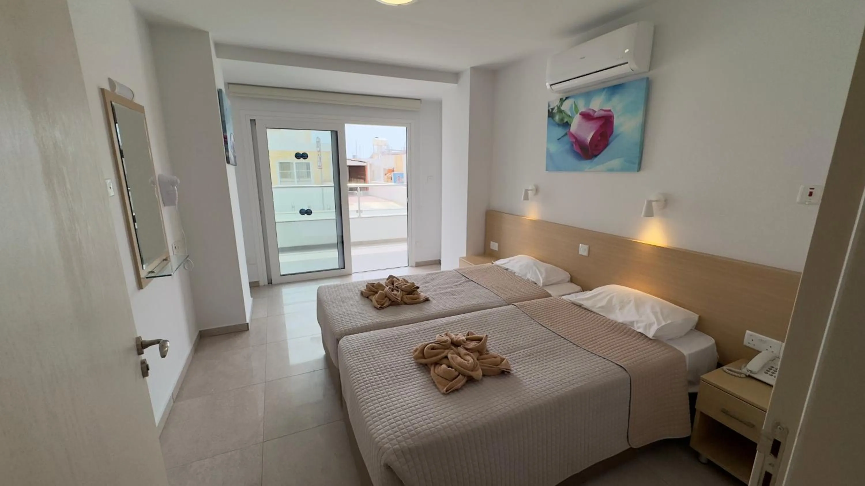 Bed in Christabelle Hotel Apartments