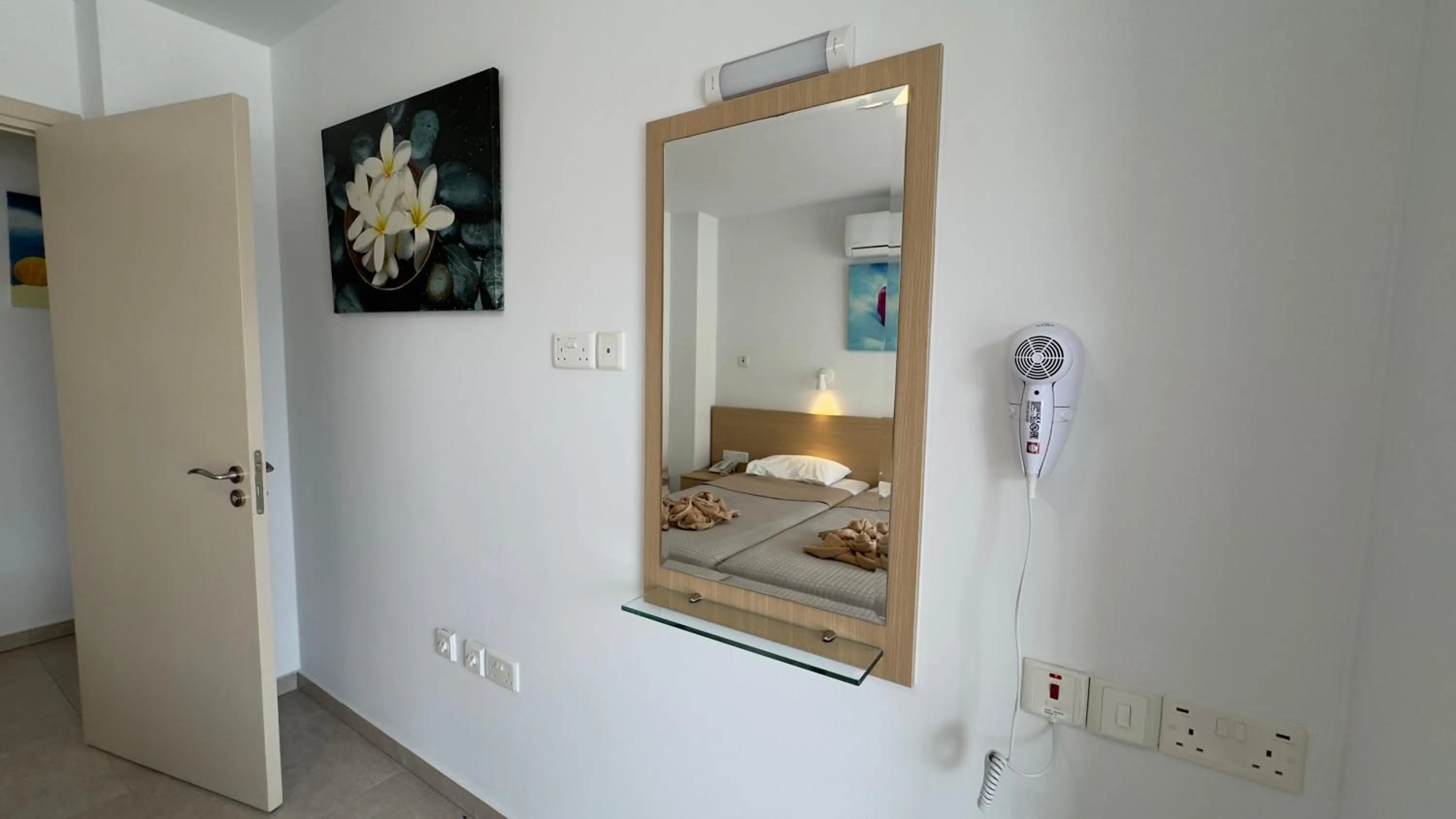 Bed in Christabelle Hotel Apartments