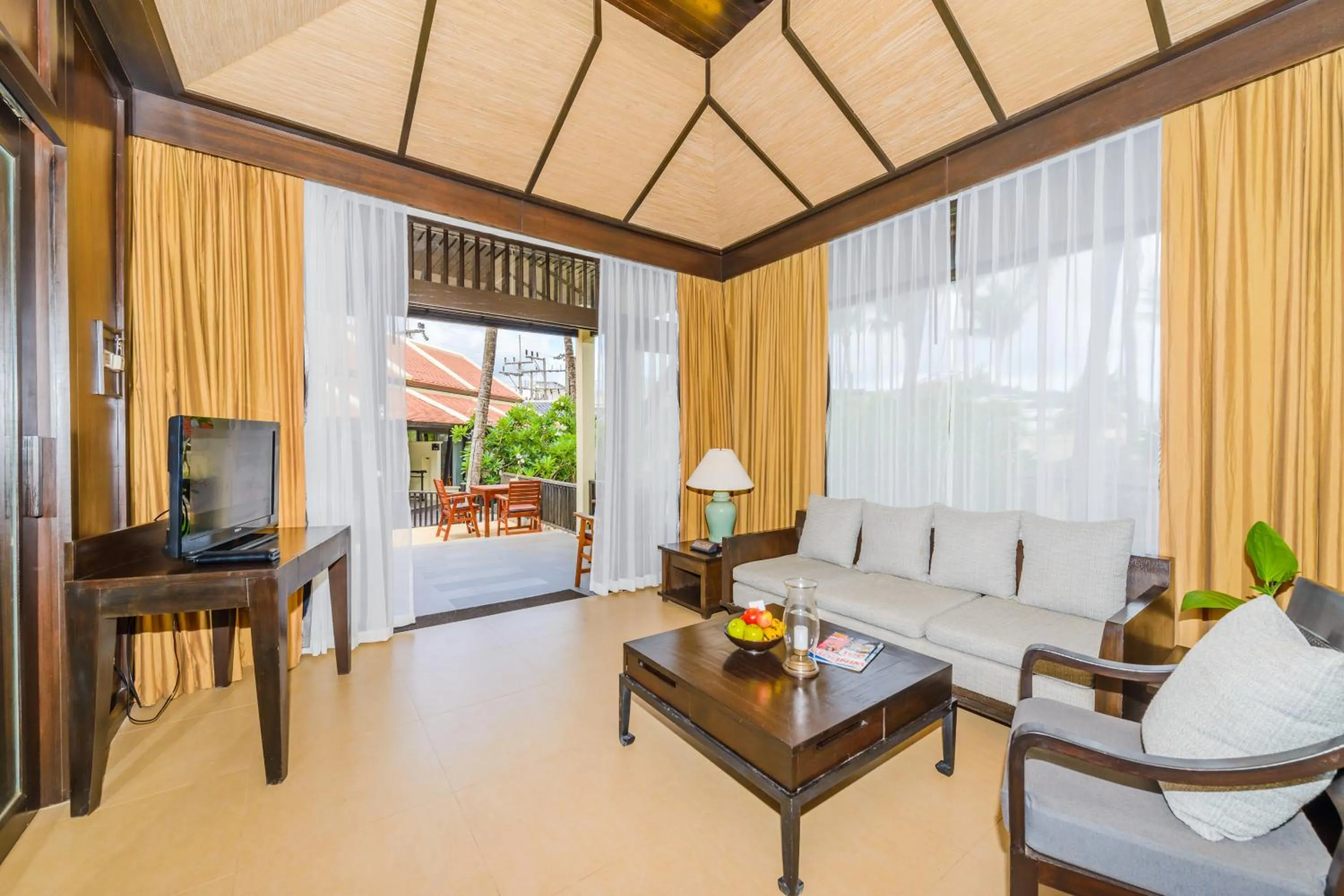 Living room in Impiana Beachfront Resort Patong, Phuket