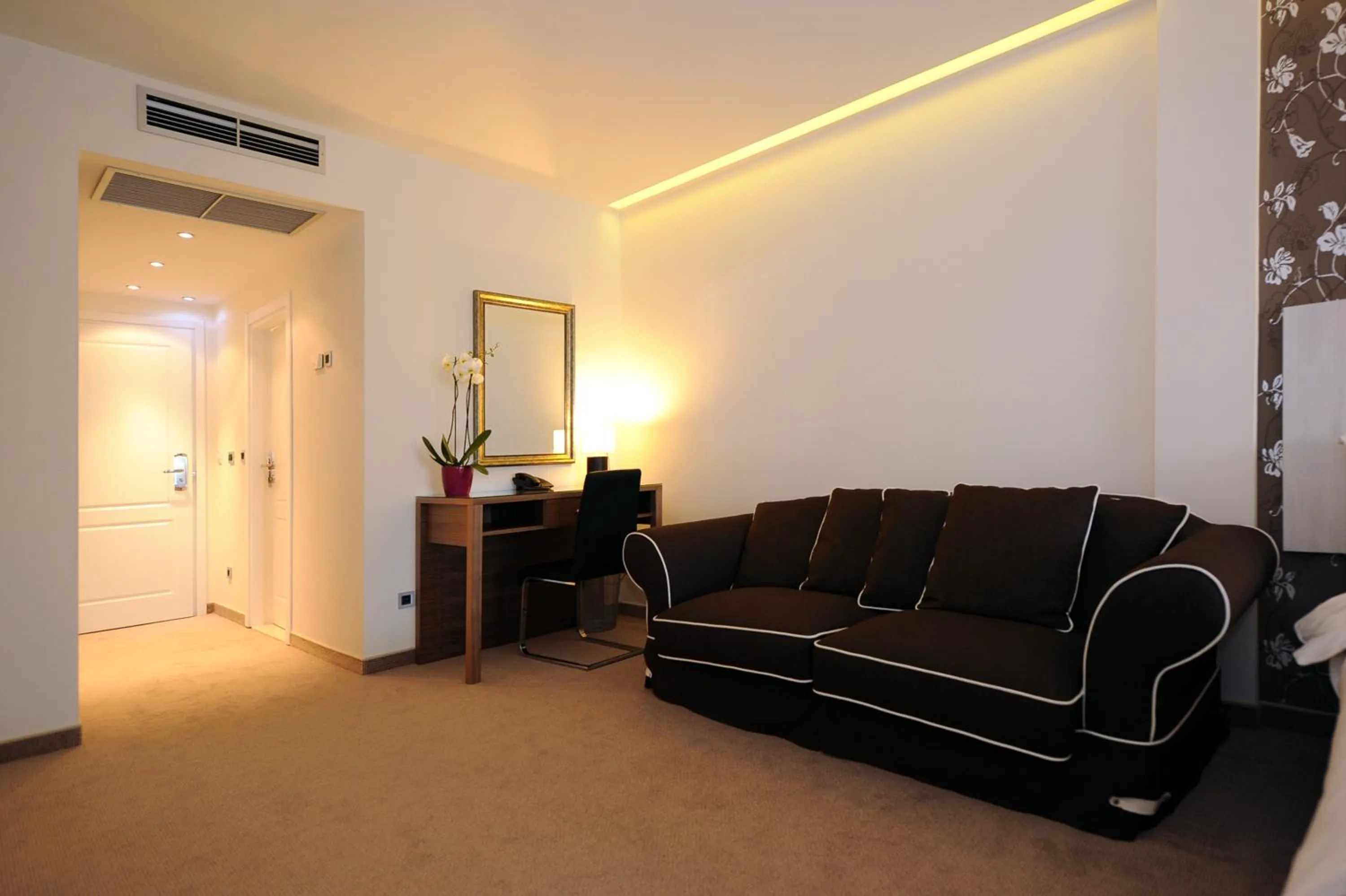 Bedroom in Hotel 1000 Ruza