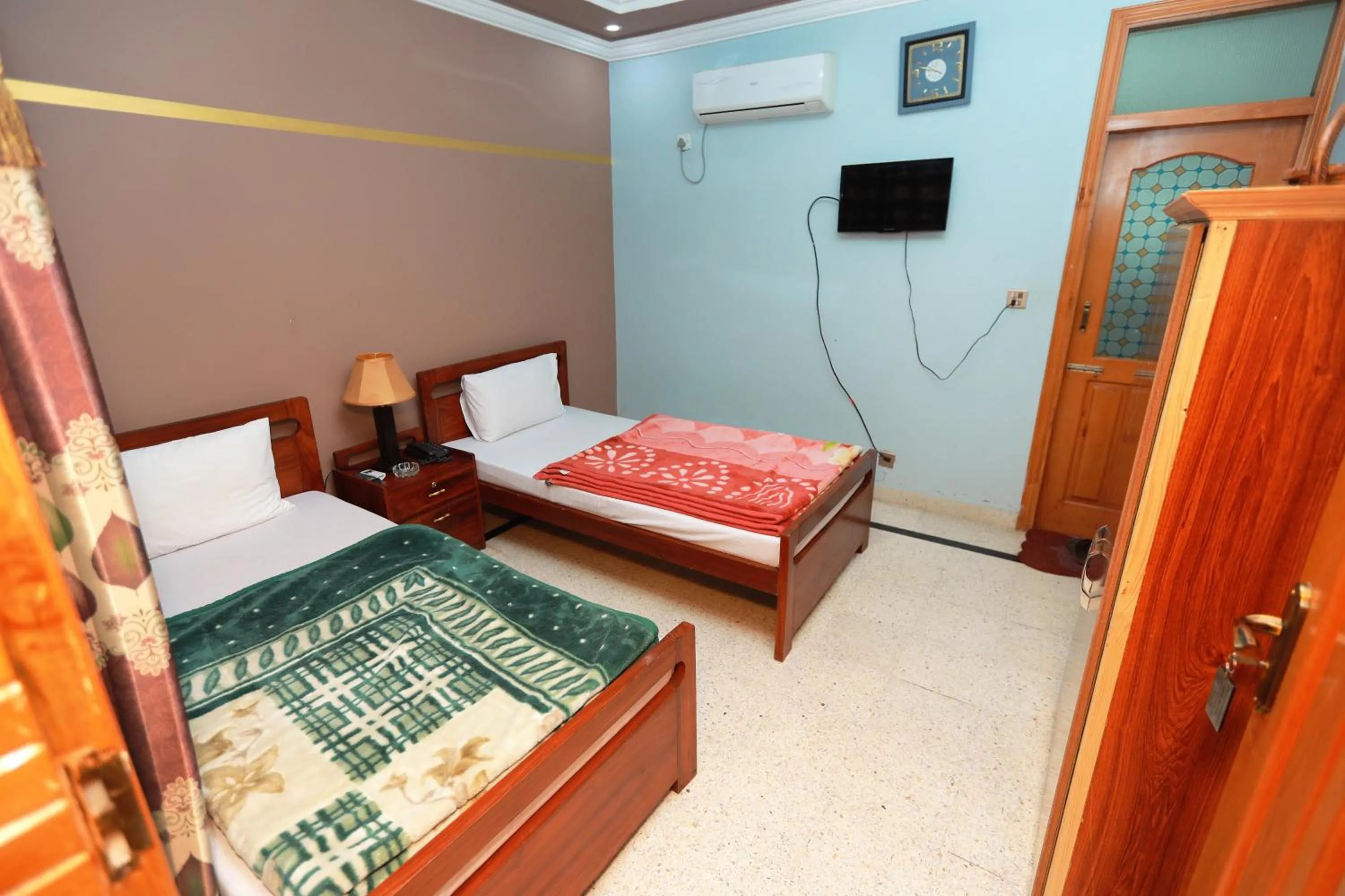 Bed in Muzaffarabad View Motel