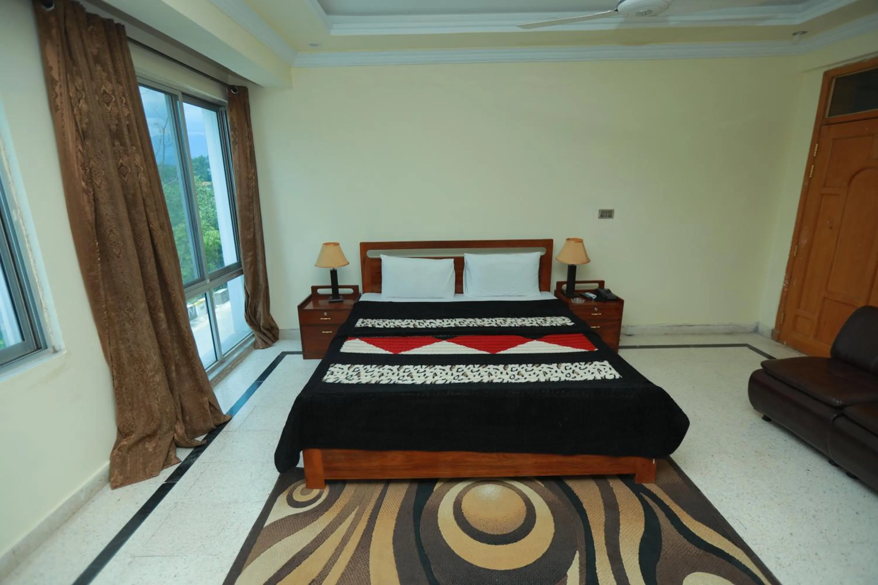 Bed in Muzaffarabad View Motel