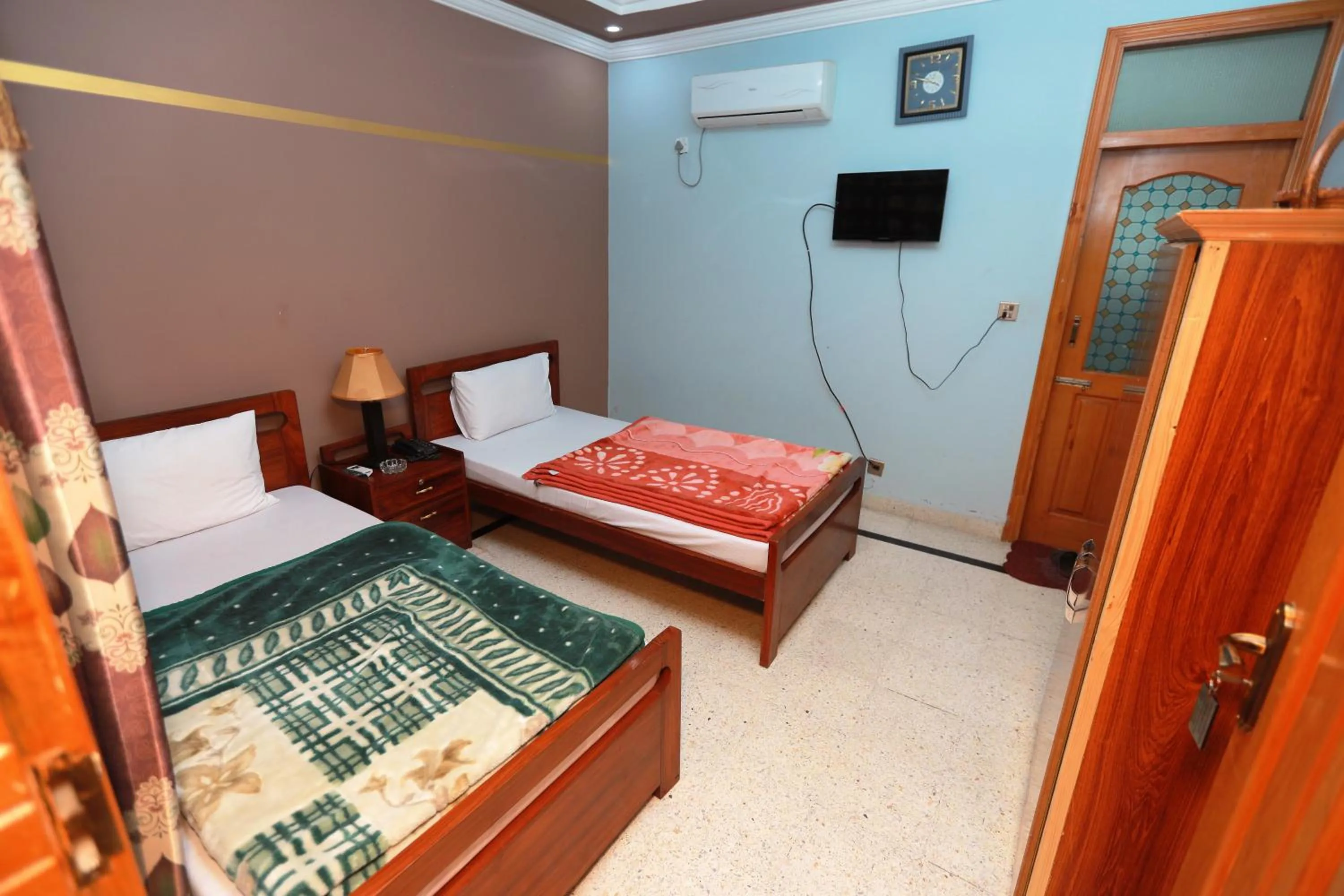 Bed in Muzaffarabad View Motel