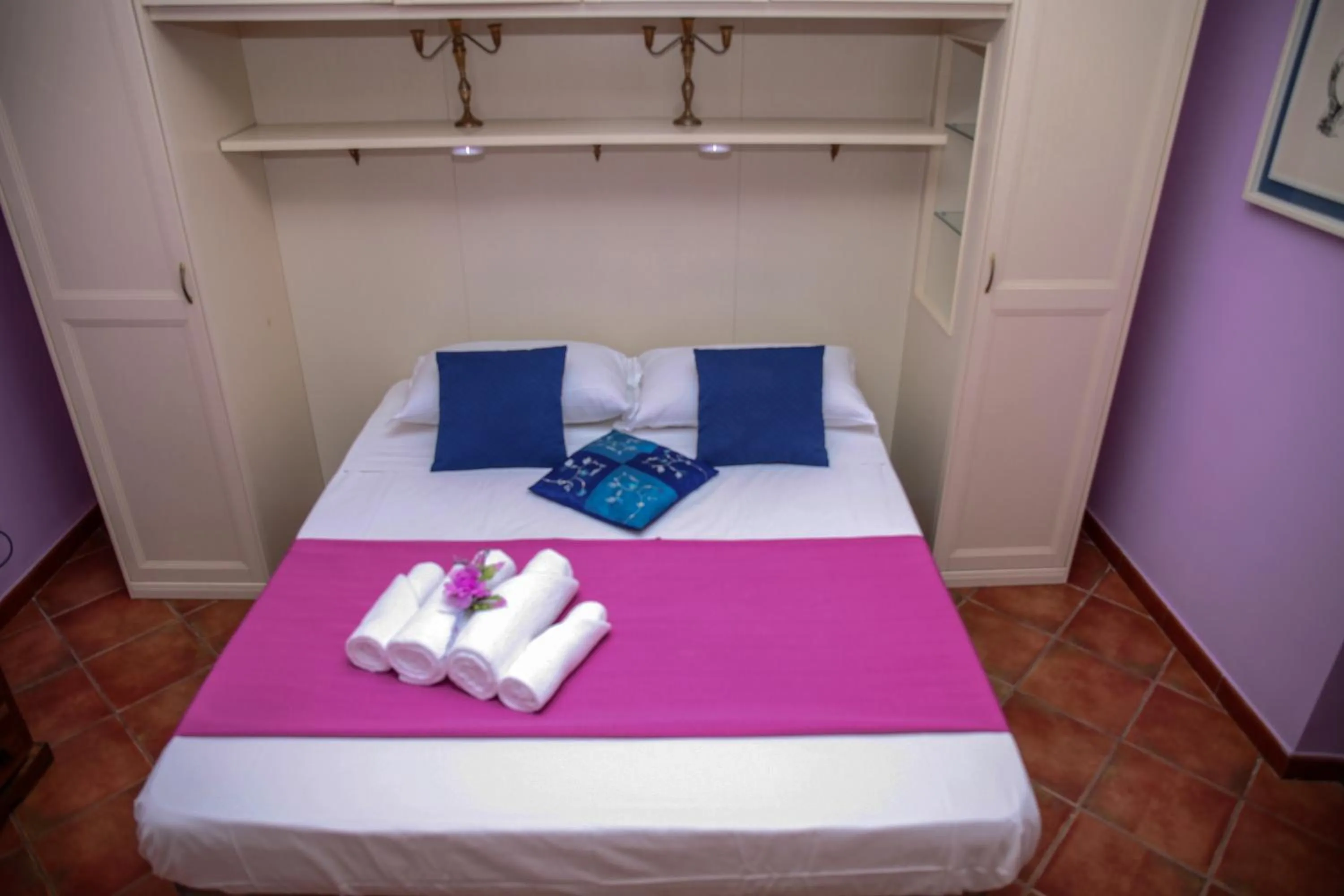 Bed in Paoline's suite in villa