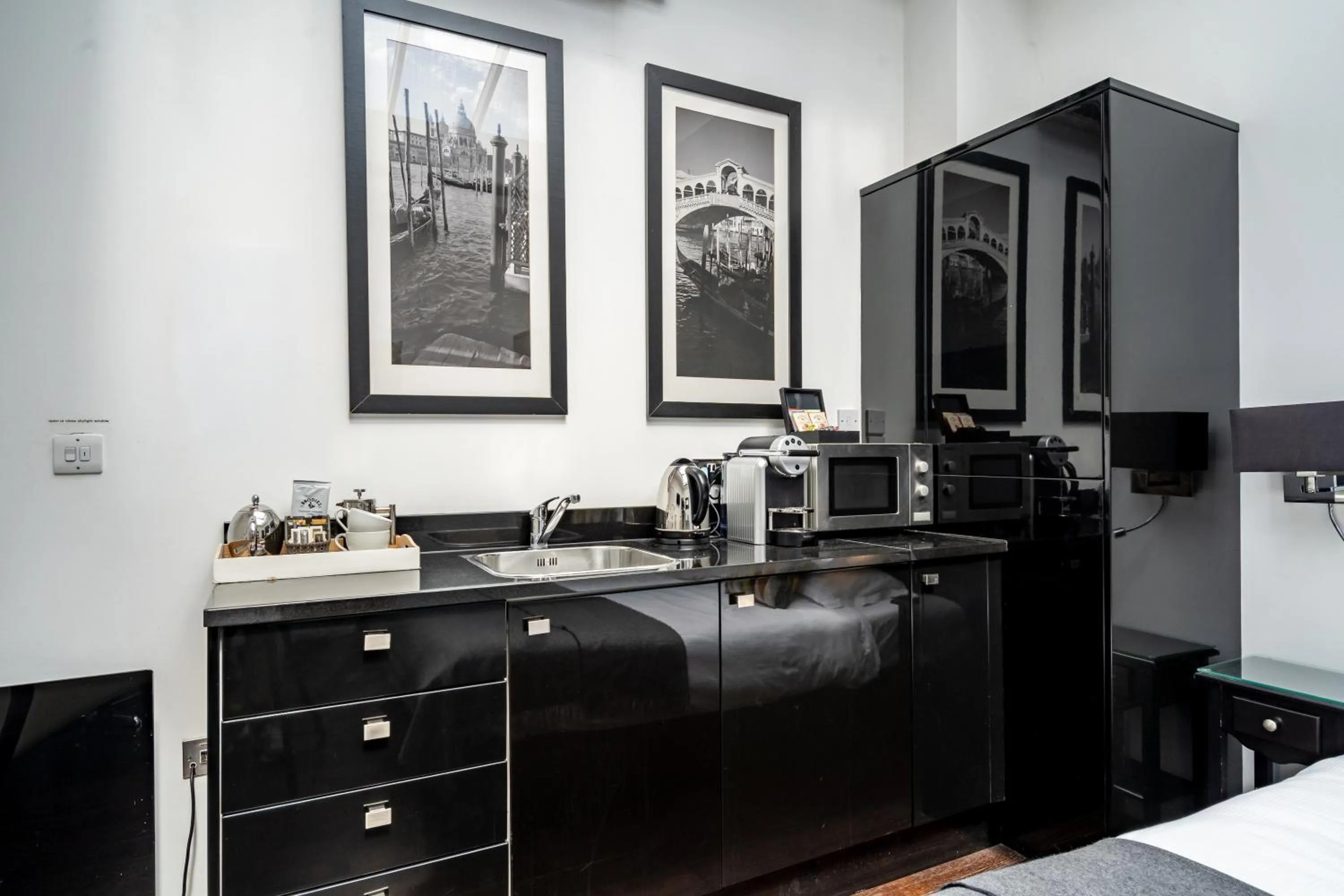 Kitchen or kitchenette in Strozzi Palace Suites by Mansley