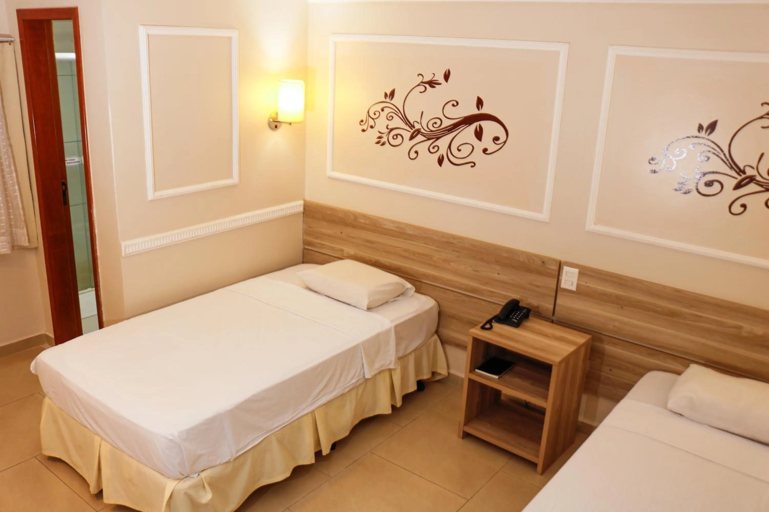 Bed in Atalanta Hotel