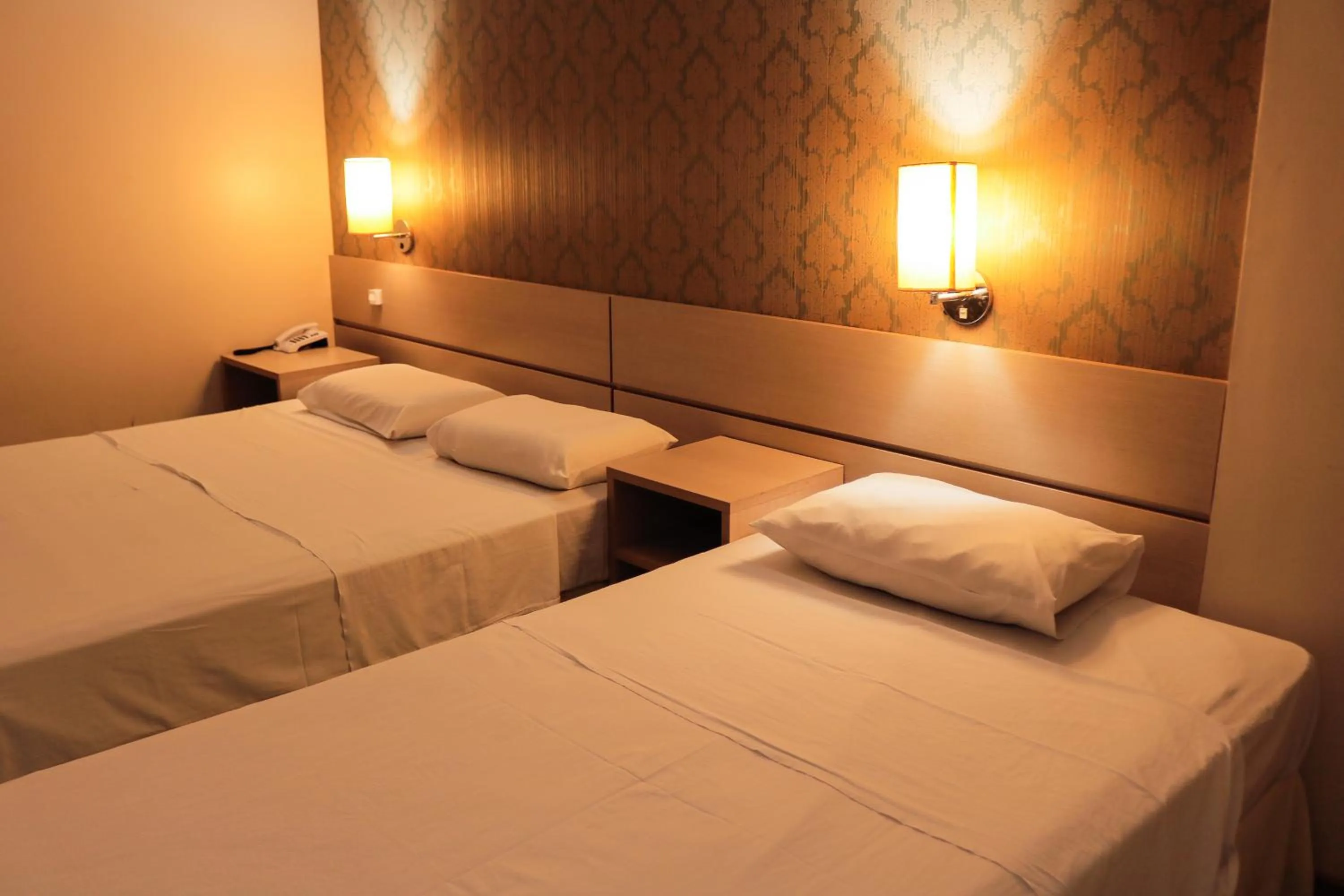 Bed in Atalanta Hotel