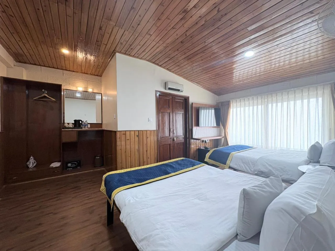 Bed in Cochrane Place By Teesta Hotels