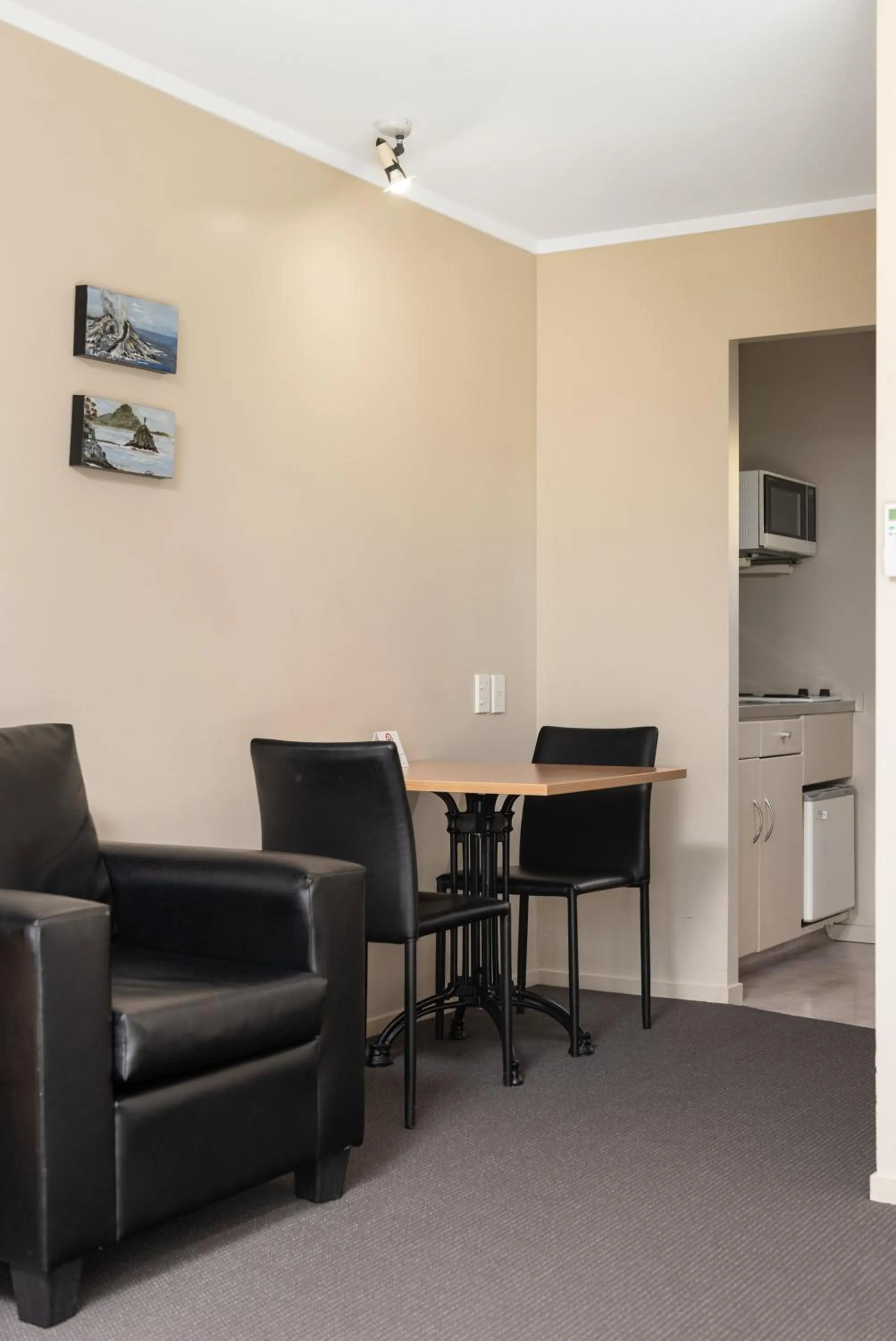 Dining area in ASURE Macy's Motor Inn