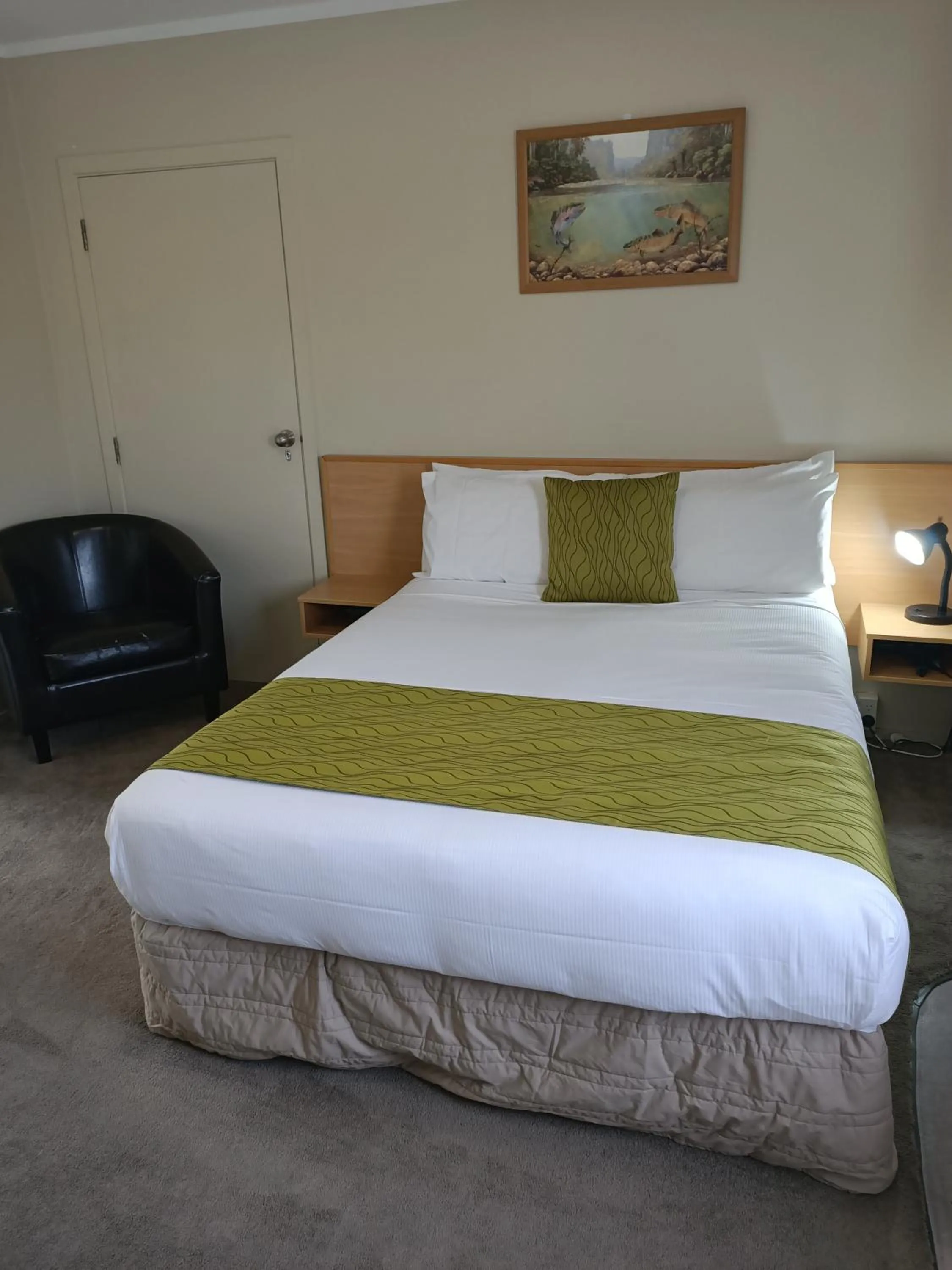 Bed in ASURE Macy's Motor Inn