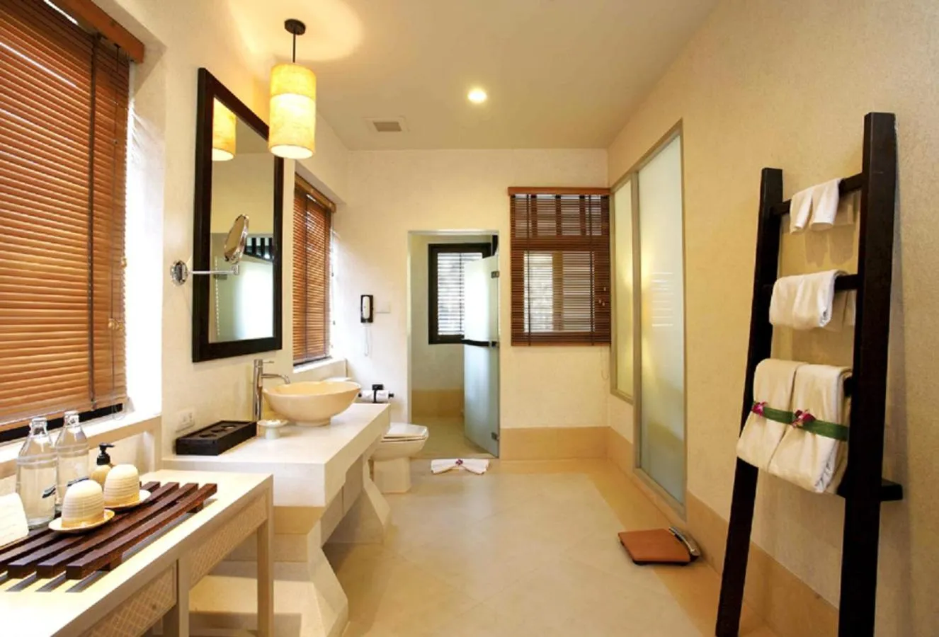 Bathroom, Bed in Melati Beach Resort & Spa